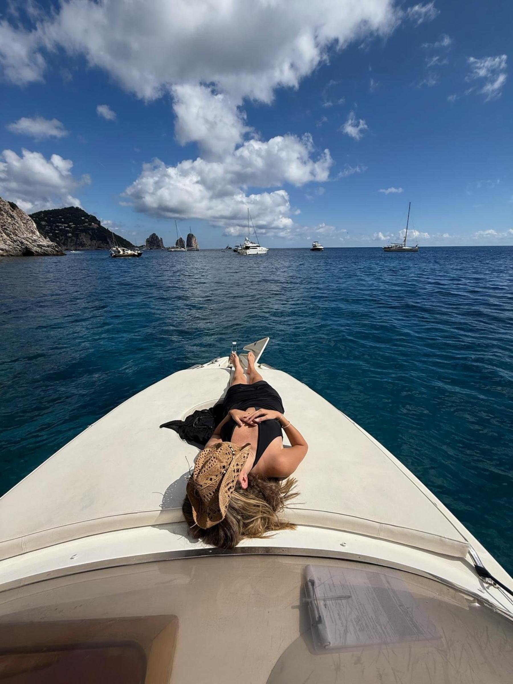 Capri Private Boat Tour: Faraglioni, Sea Caves & Swimming Stops