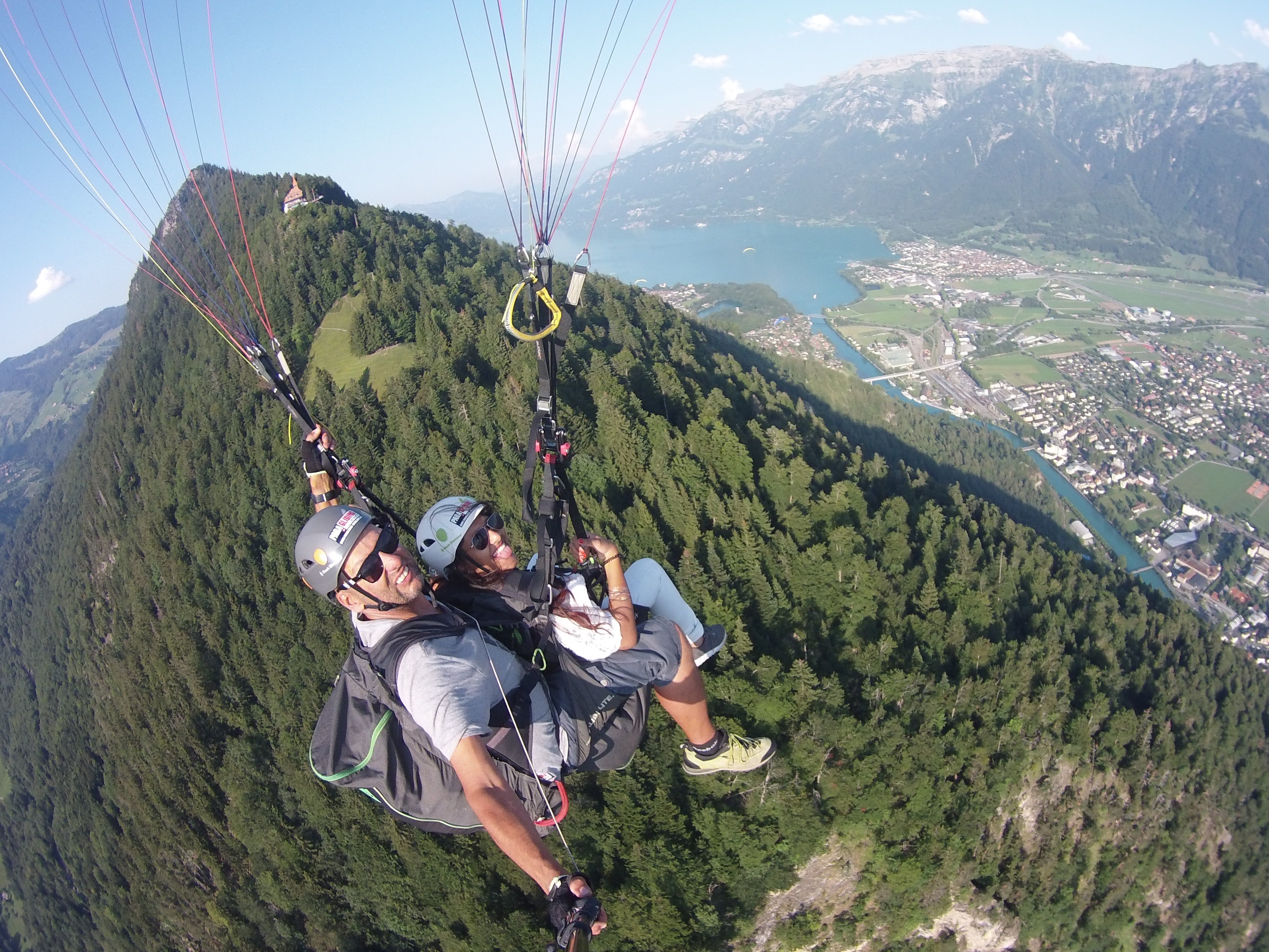 From Geneva: Interlaken Day Trip with Tandem Paragliding Experience