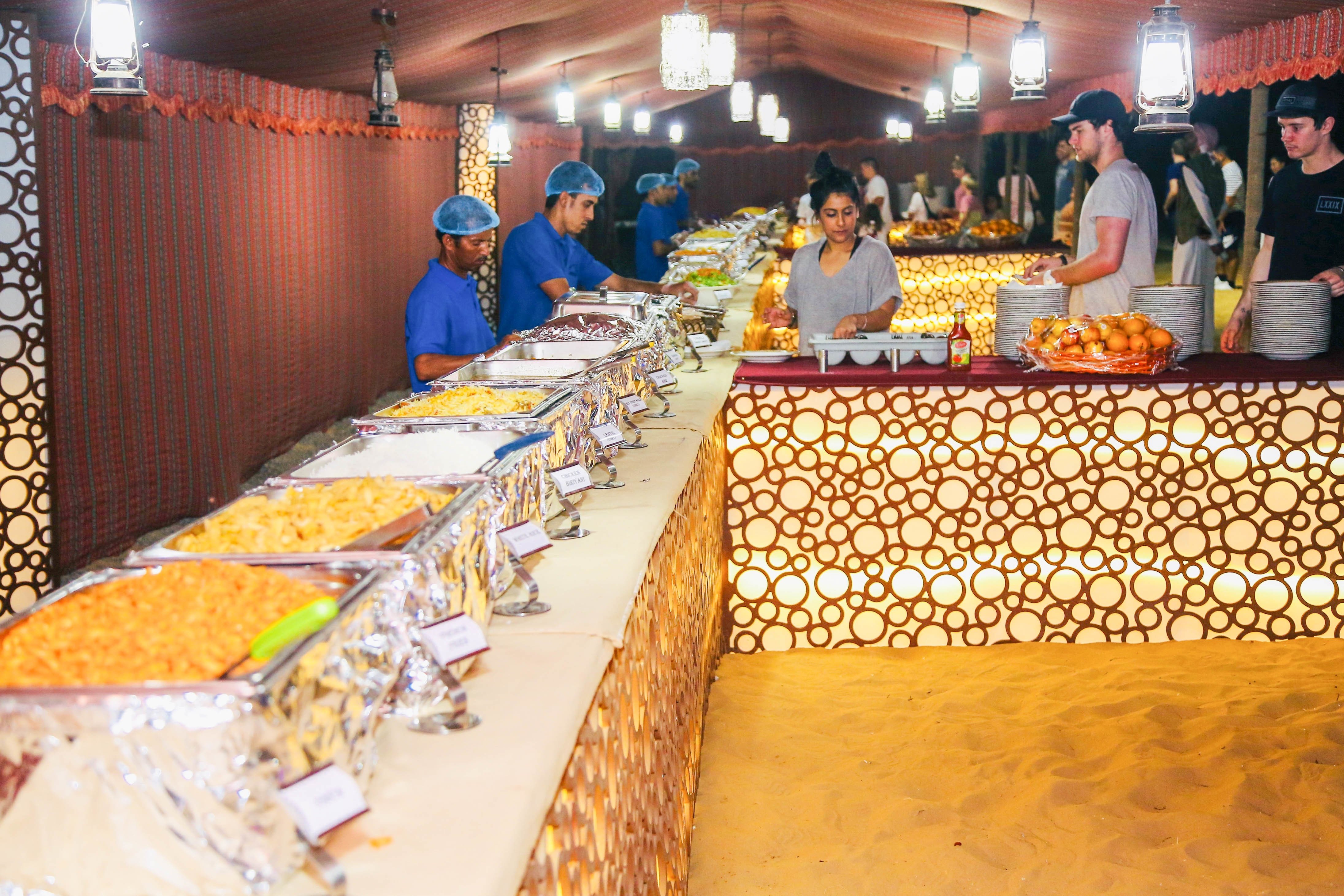 Abu Dhabi Desert Safari with Quad Biking & Traditional Camp Evening