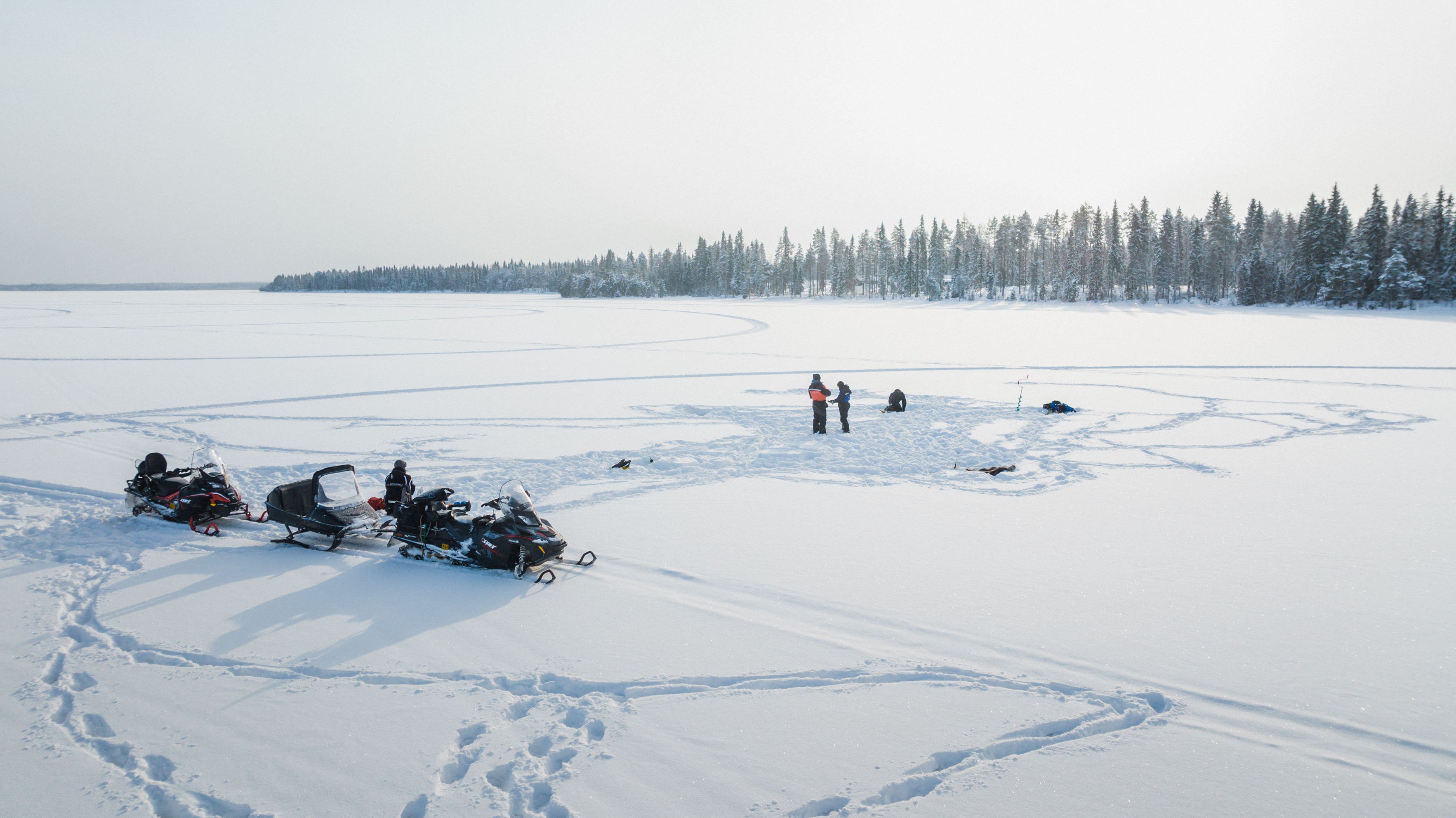 Rovaniemi Snowmobile Safari & Ice Fishing Adventure