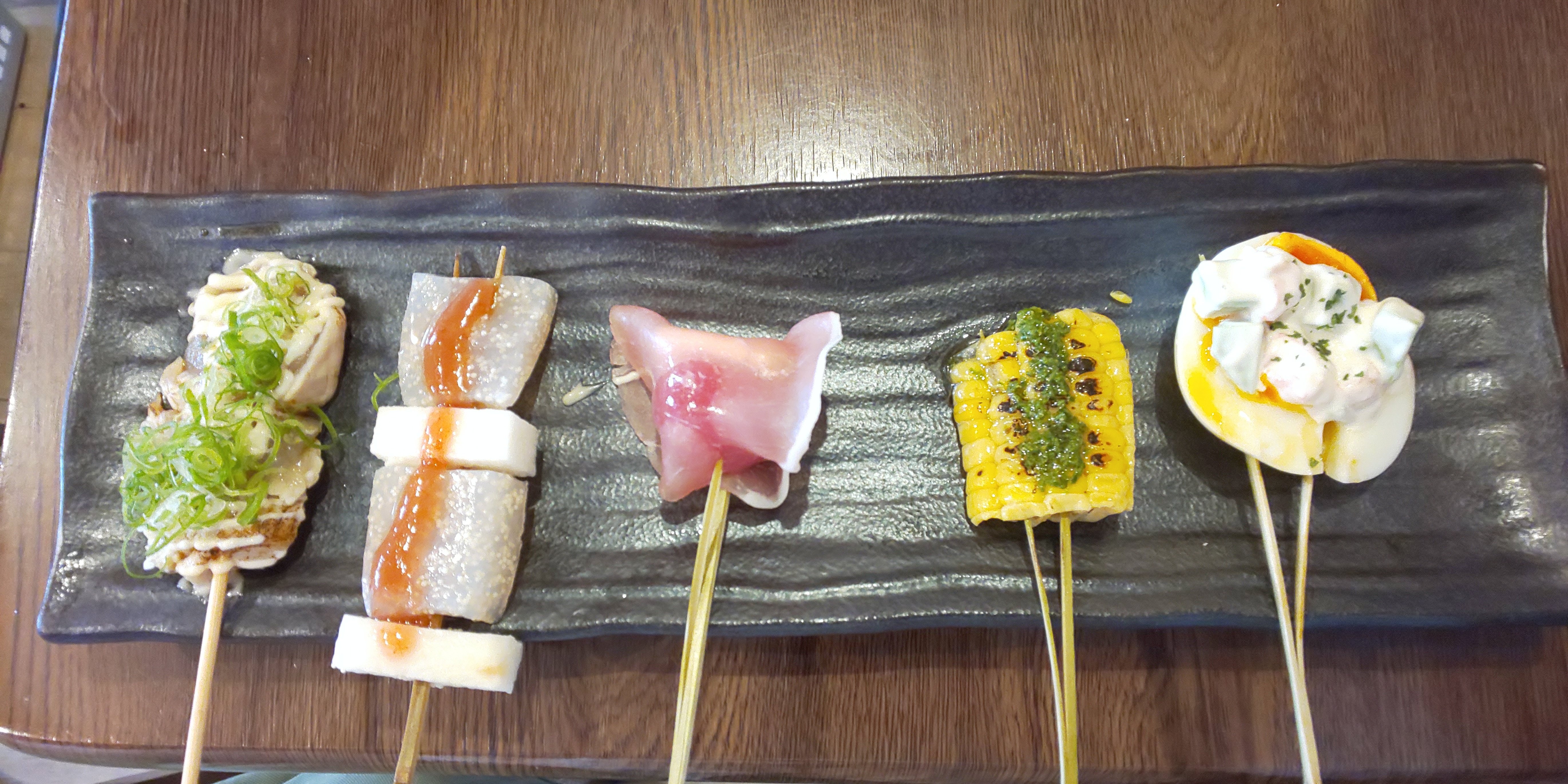 Osaka food tour — Dotonbori neon, Shinsekai kushikatsu streets and Kuromon Ichiba market — image 7