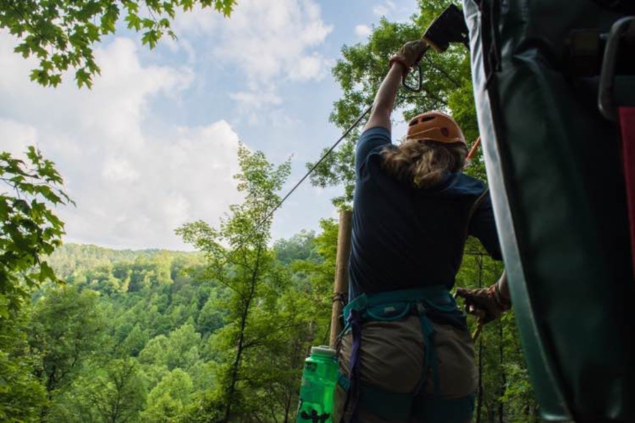 Group ziplining through the Great Smoky Mountains on a Pigeon Forge tour