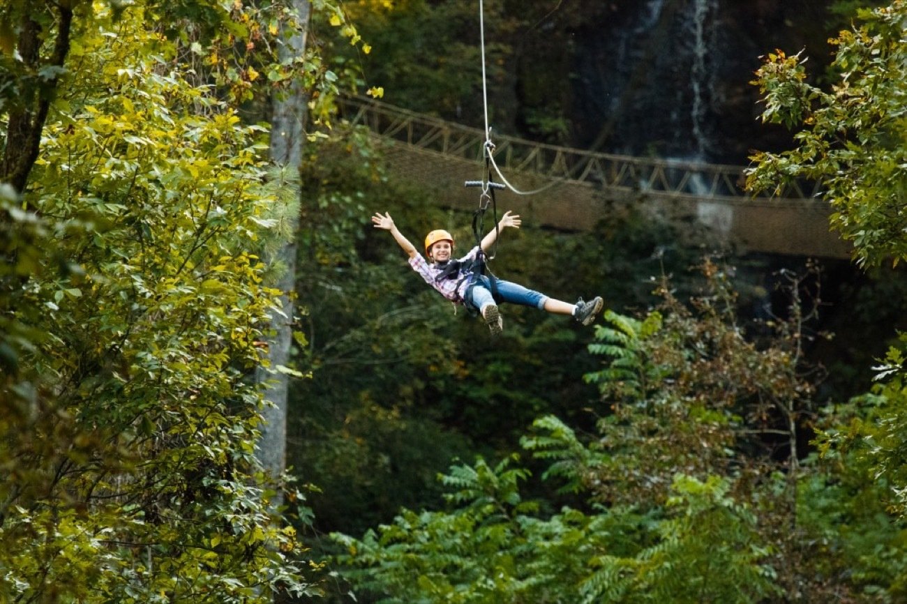 Sevierville waterfall canopy zipline flying over a Smoky Mountains waterfall