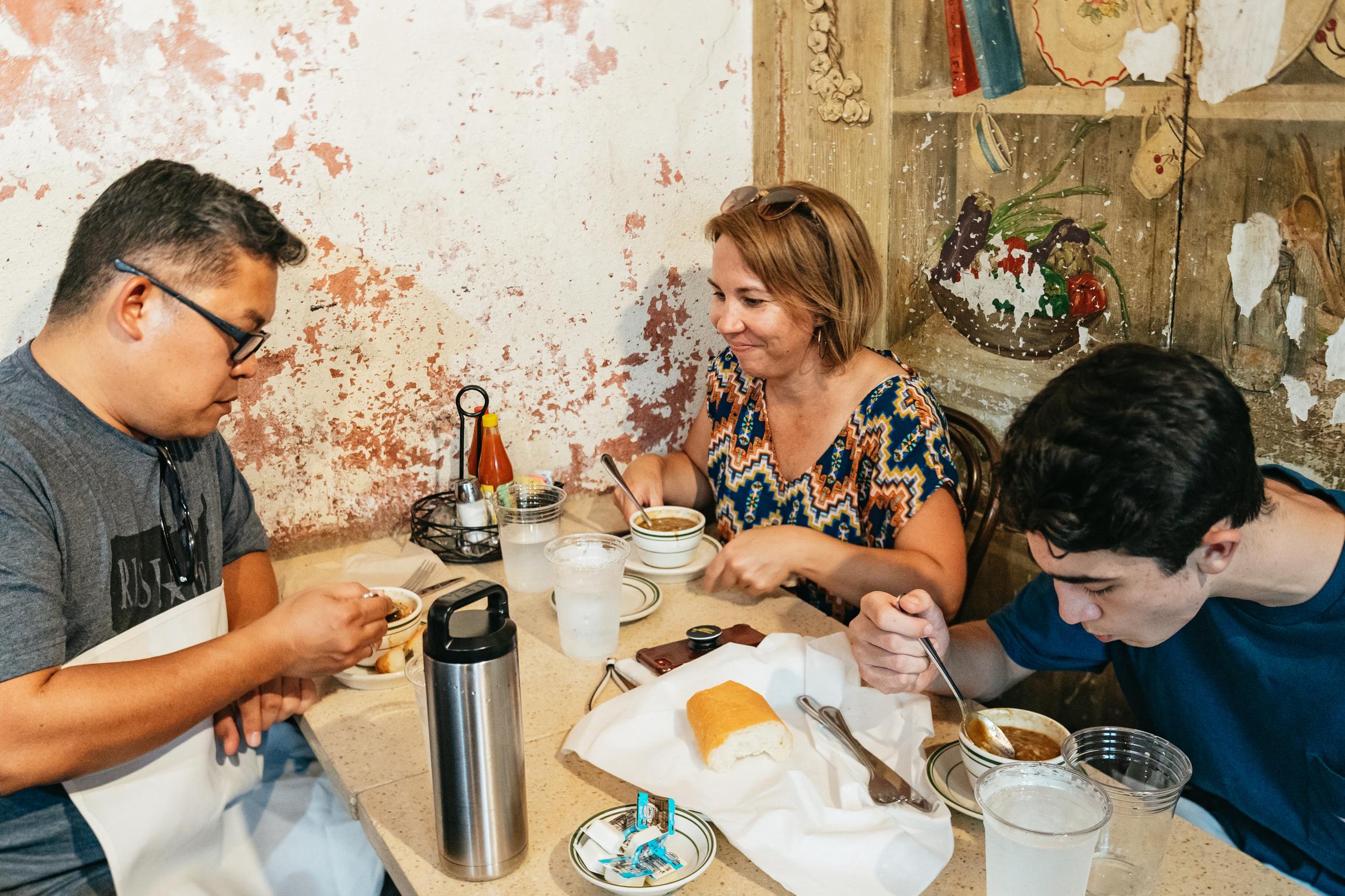 Fresh beignets dusted with powdered sugar on a New Orleans food tour