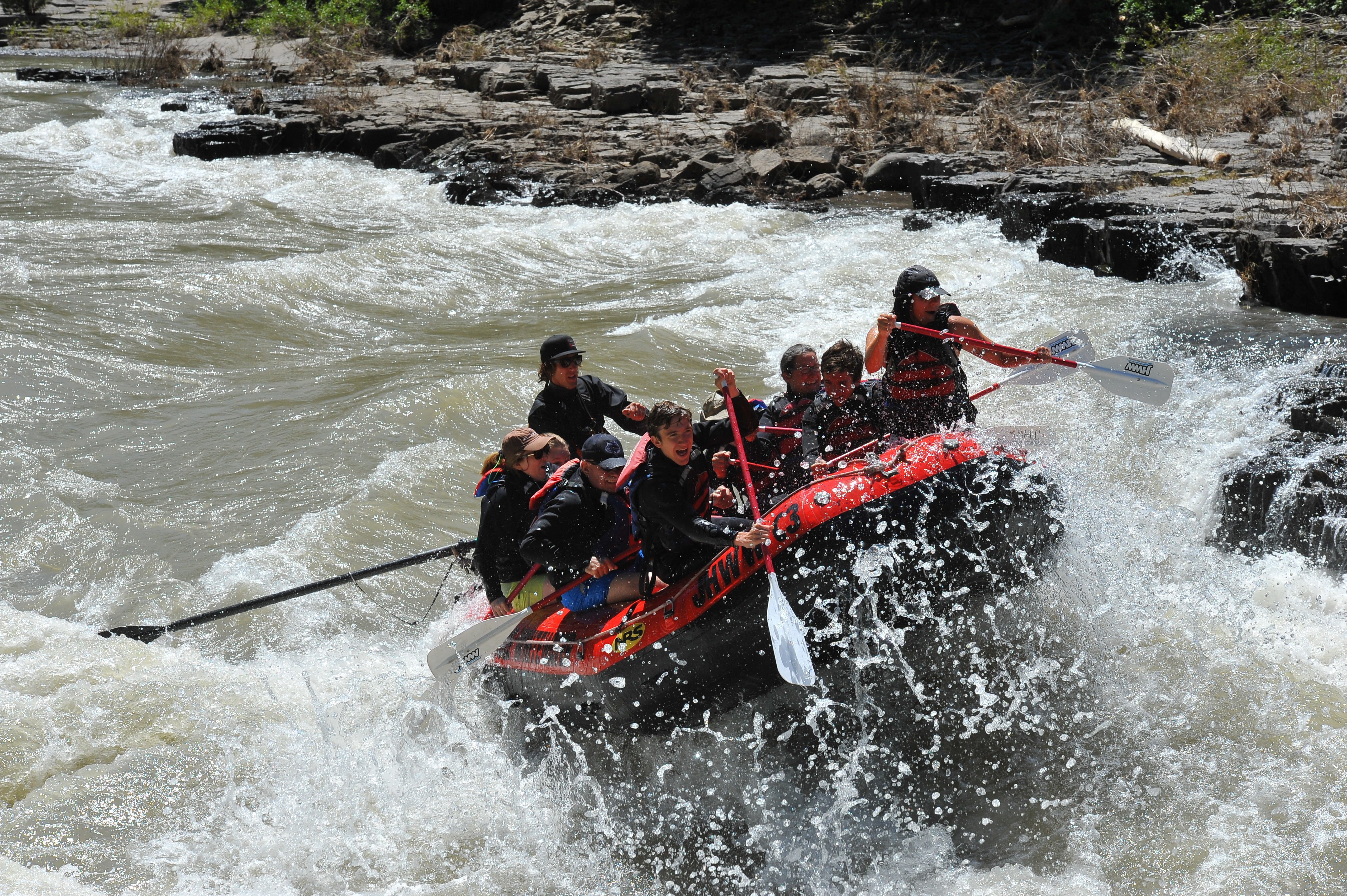 Family white water rafting on the Snake River near Grand Teton, Jackson Hole