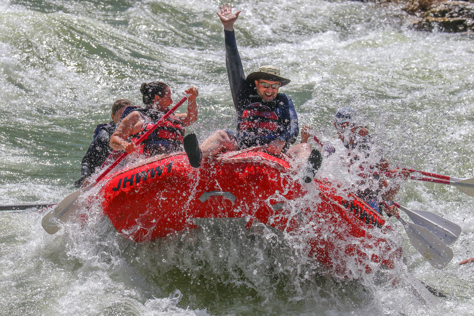 Snake River Canyon rafting adventure with splash gear and life jackets, Jackson Hole