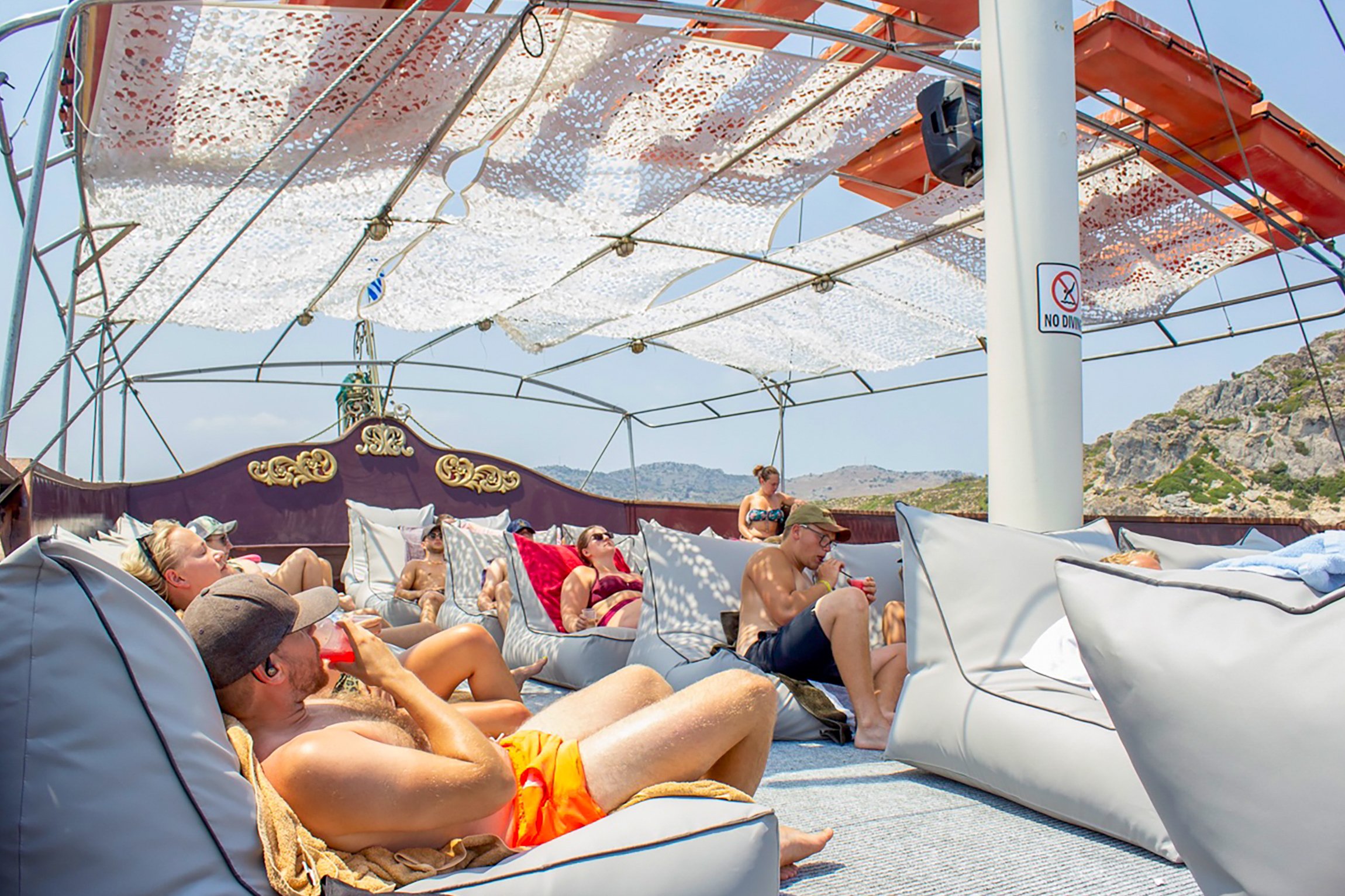 Rhodes Sunset Cruise with Greek BBQ & Unlimited Drinks