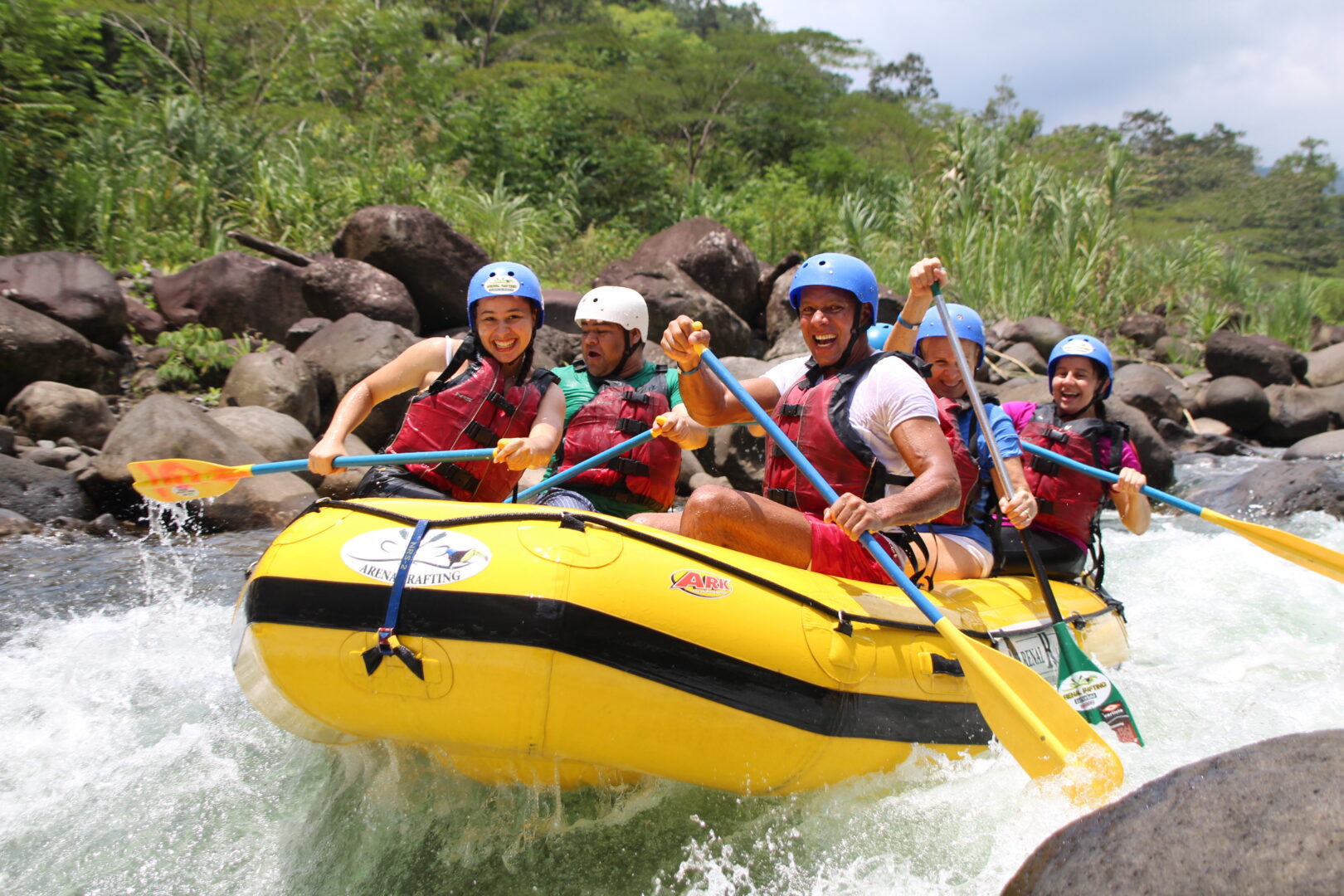 Balsa River rafting with rainforest banks and wildlife near Arenal, Costa Rica
