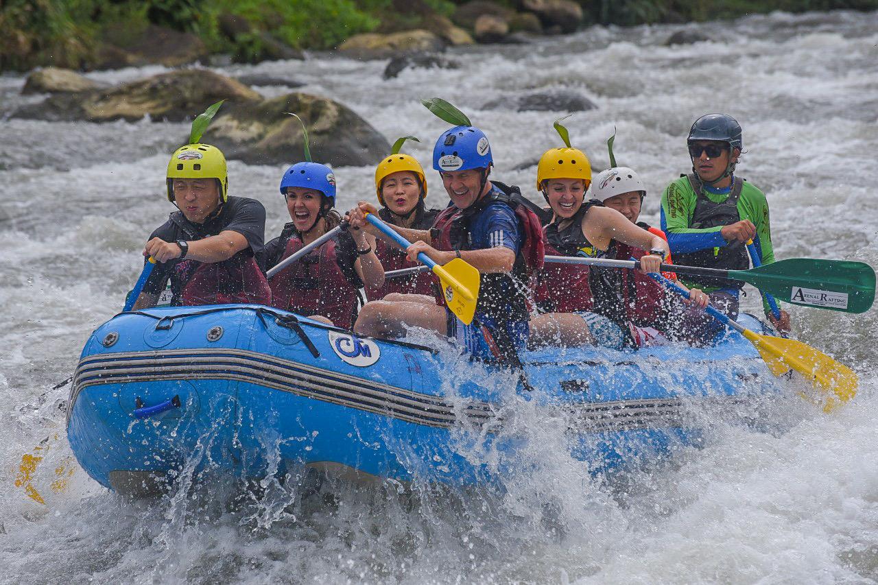 Costa Rica rafting guide steering a raft down the Balsa River near La Fortuna