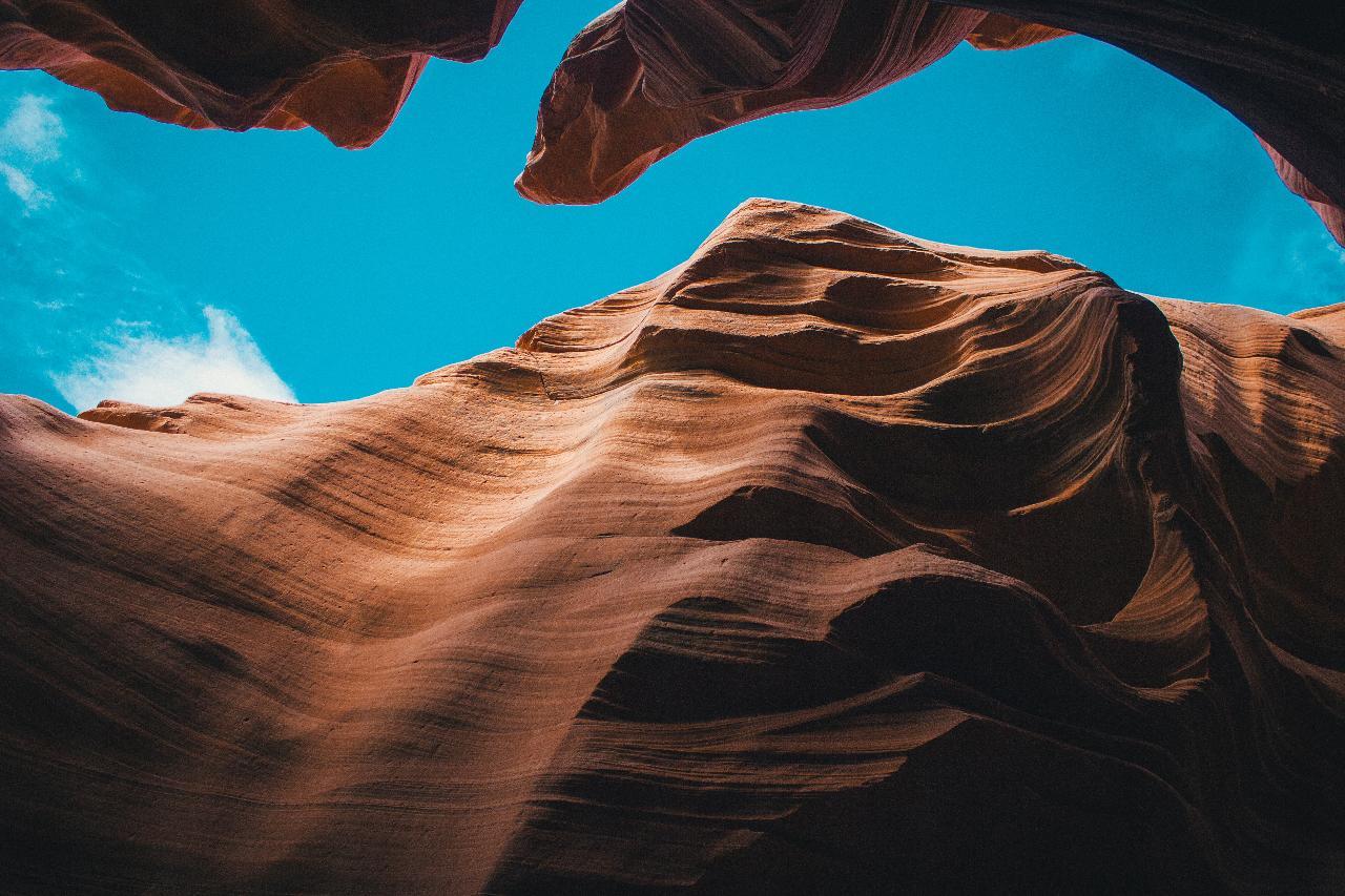 Upper Antelope Canyon light beams and sandstone walls — image 3