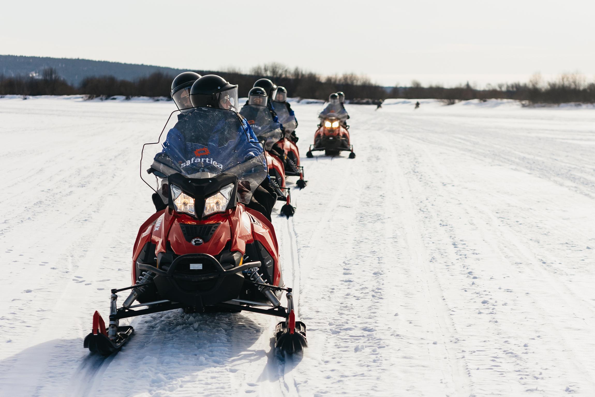 Rovaniemi Snowmobile & Ice Fishing Adventure with Campfire Lunch