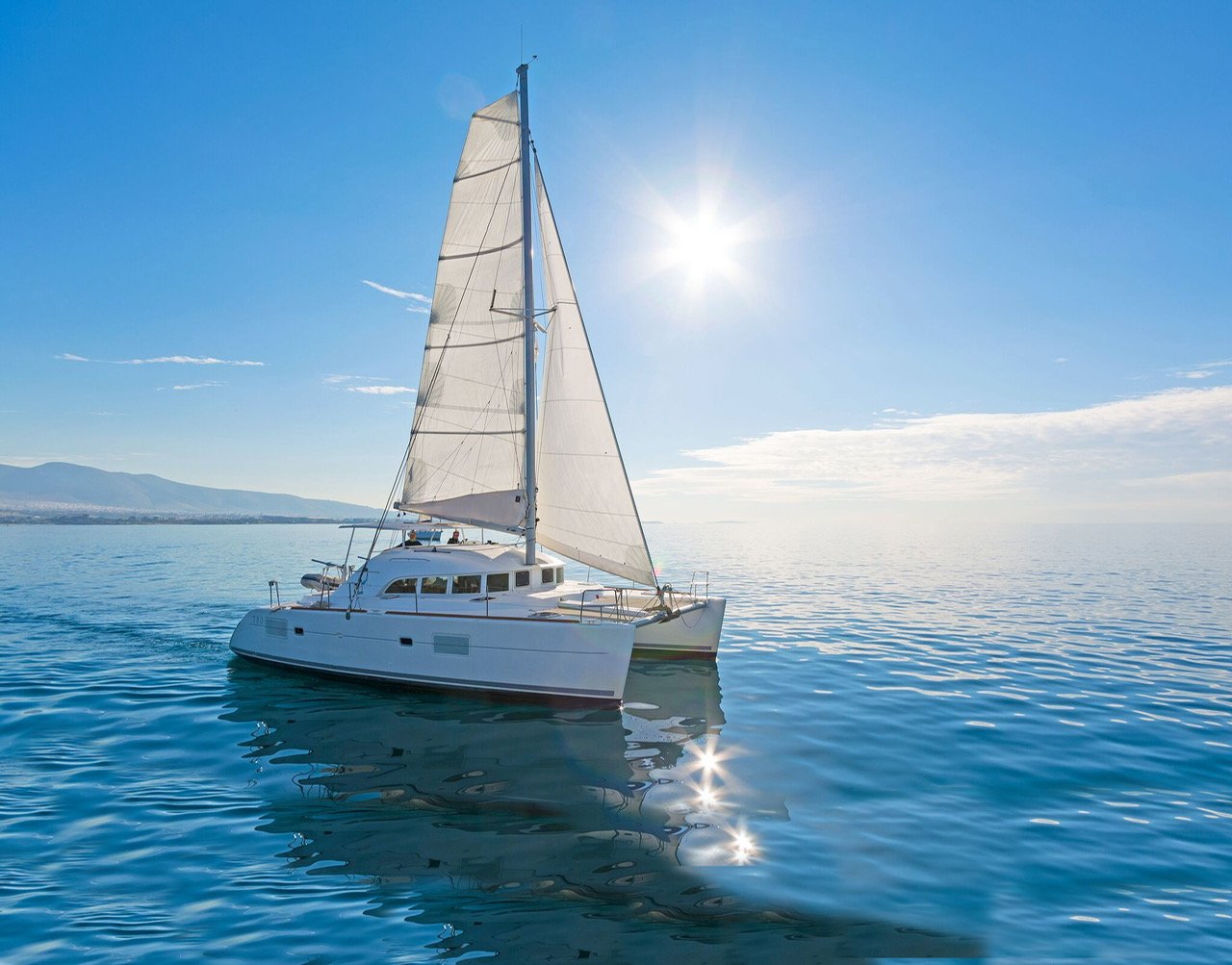 Mykonos Private Catamaran Escape with Lunch & Drinks