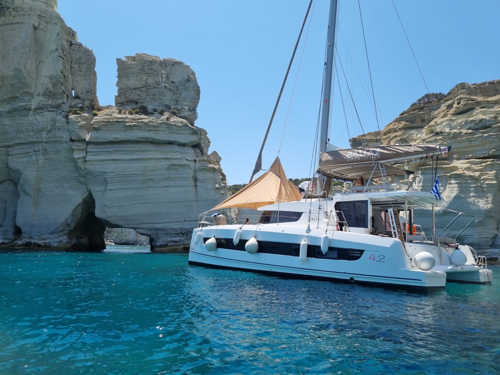 Milos & Polyegos Full-Day Catamaran Cruise with Meals and Open Bar