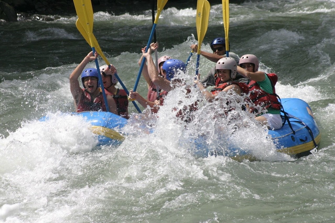 Pacuare River white water rafting through Class 3-4 rapids and rainforest gorge near Turrialba, Costa Rica