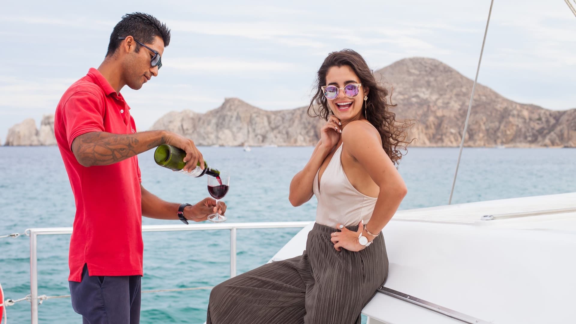 Cabo San Lucas Sunset Catamaran Cruise with Open Bar & Appetizers
