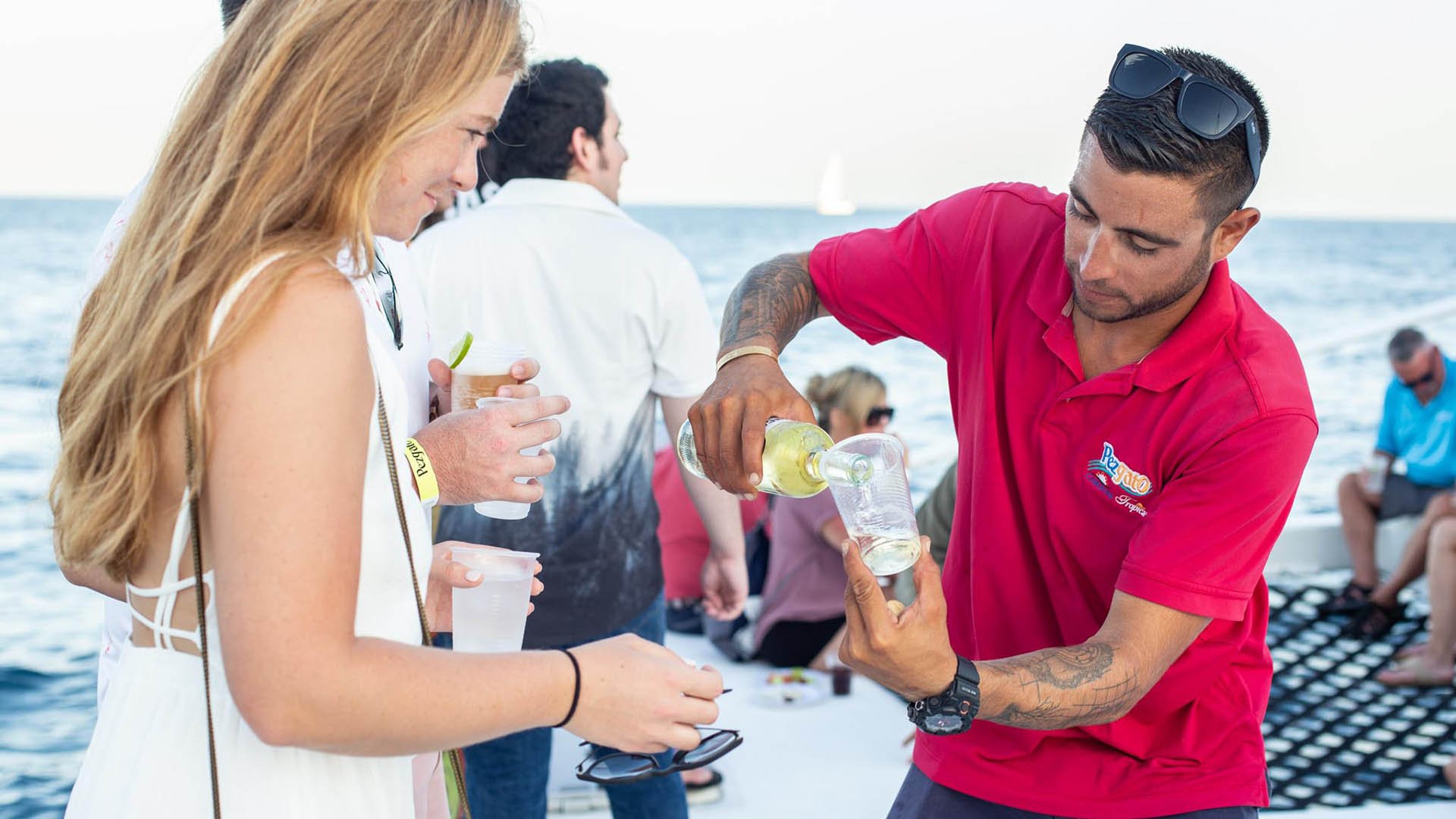 Cabo San Lucas Sunset Catamaran Cruise with Open Bar & Appetizers