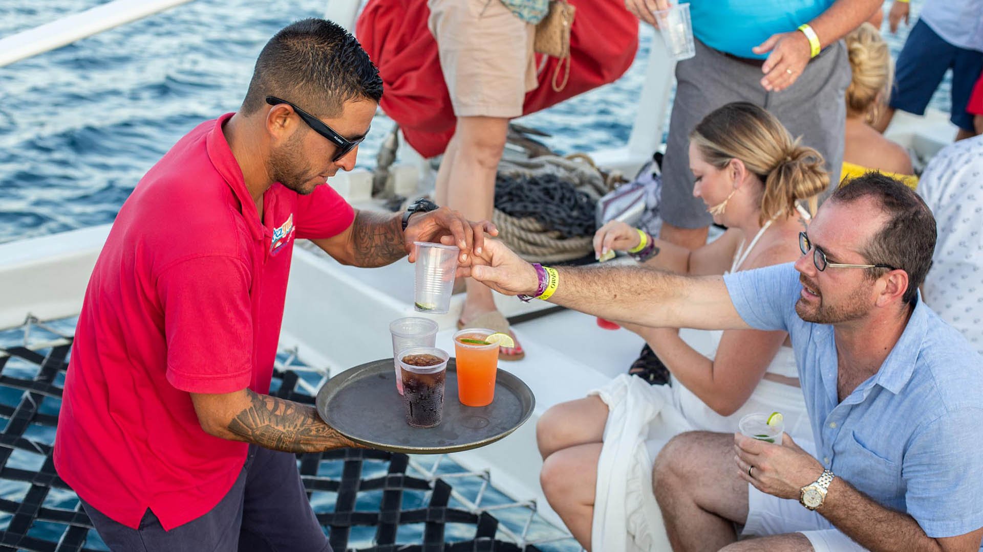 Cabo San Lucas Sunset Catamaran Cruise with Open Bar & Appetizers