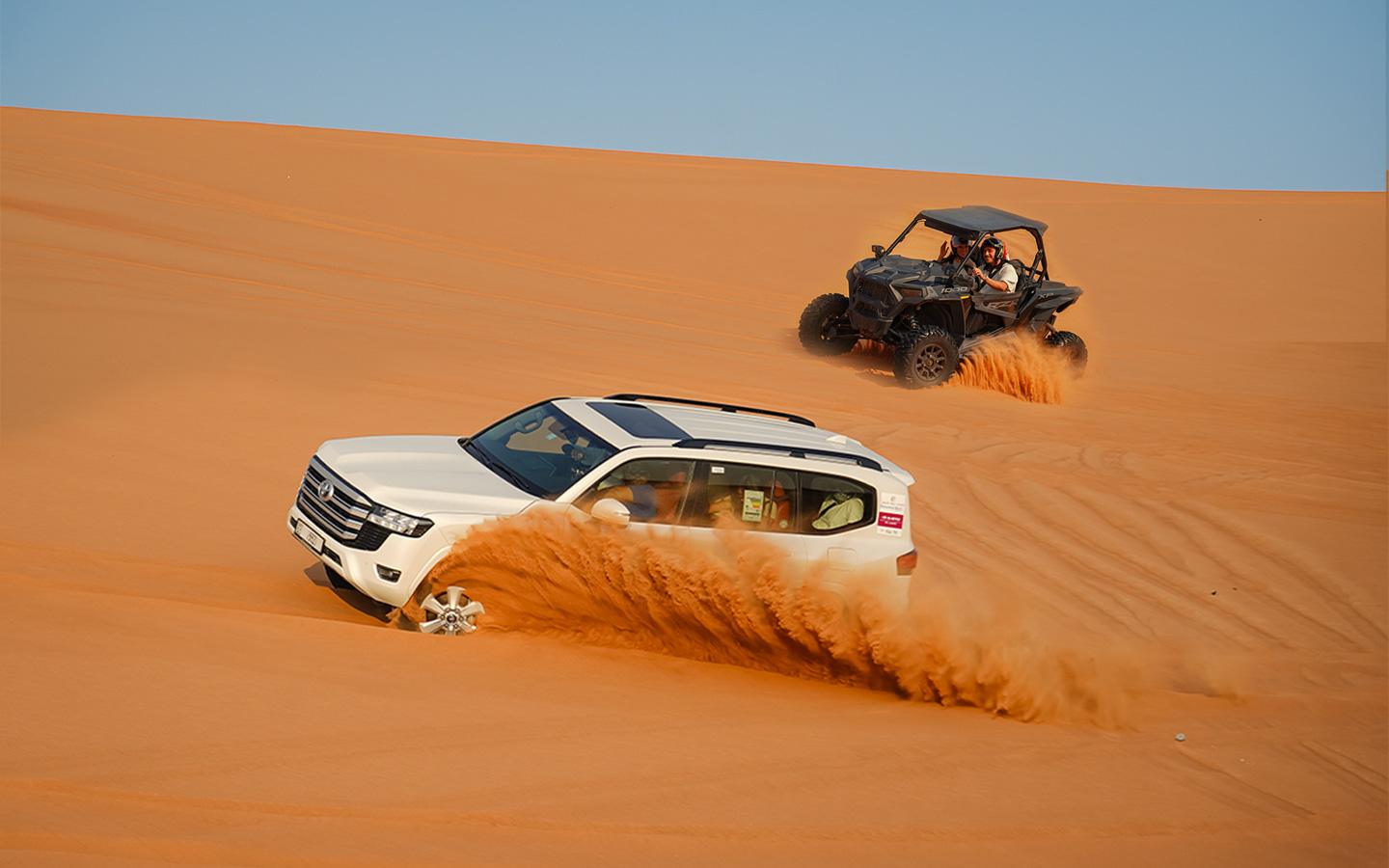 Dubai Red Dunes Adventure: Dune Buggy, Sandboarding & Camel Experience