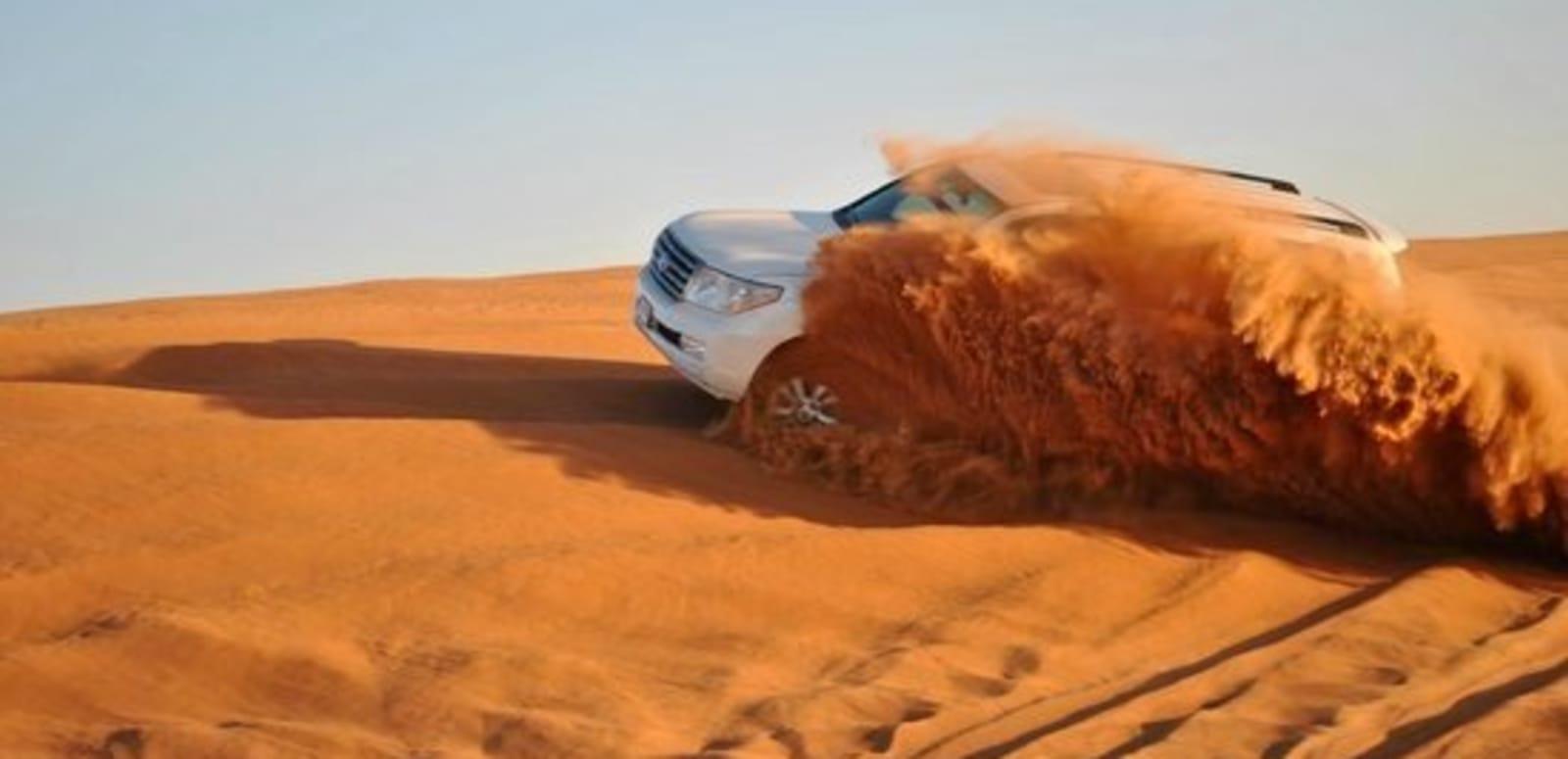 Doha Desert Adventure: Dune Bashing, Camel Rides & Sandboarding