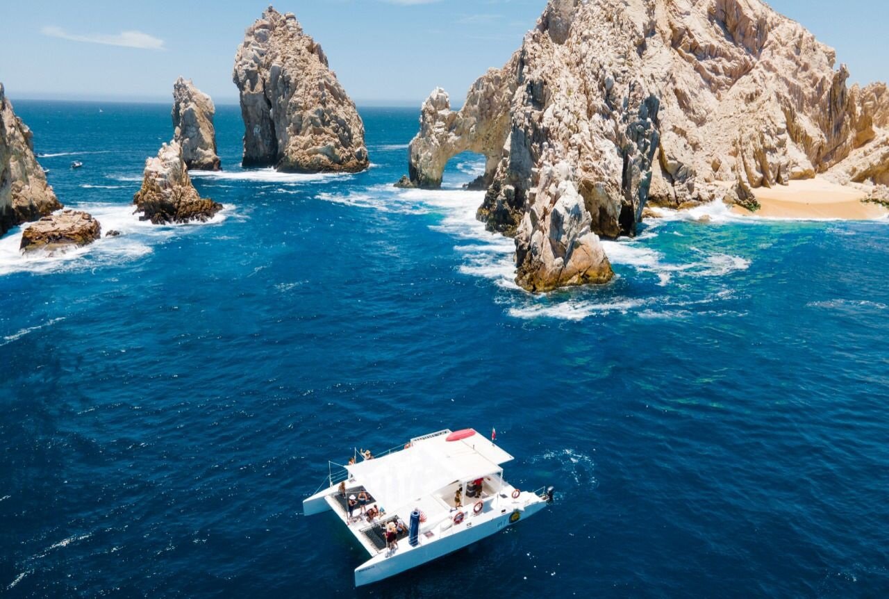 Cabo Catamaran Snorkel & Sightseeing with Open Bar