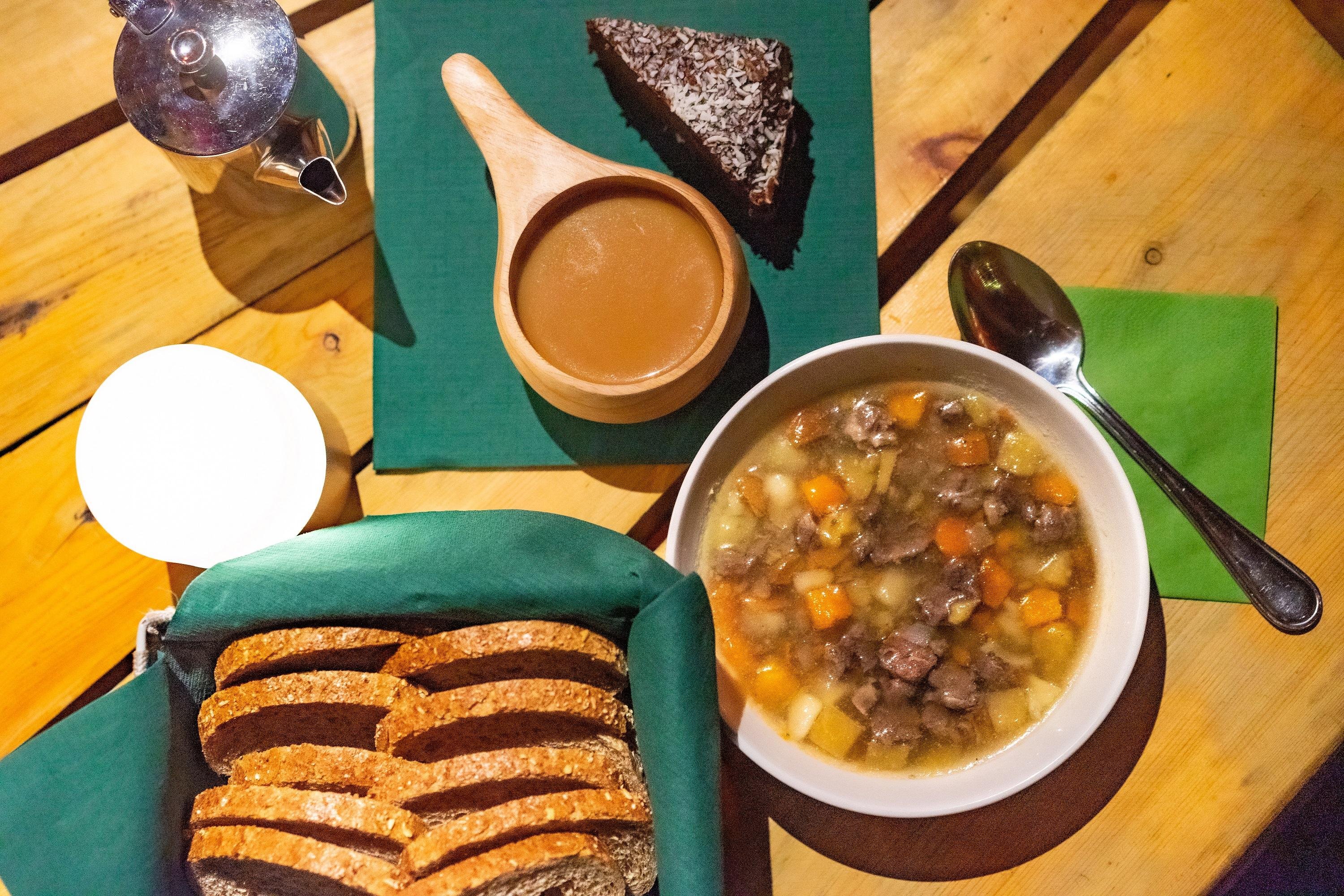 Tromsø: Guided Husky Sledding with Traditional Lunch