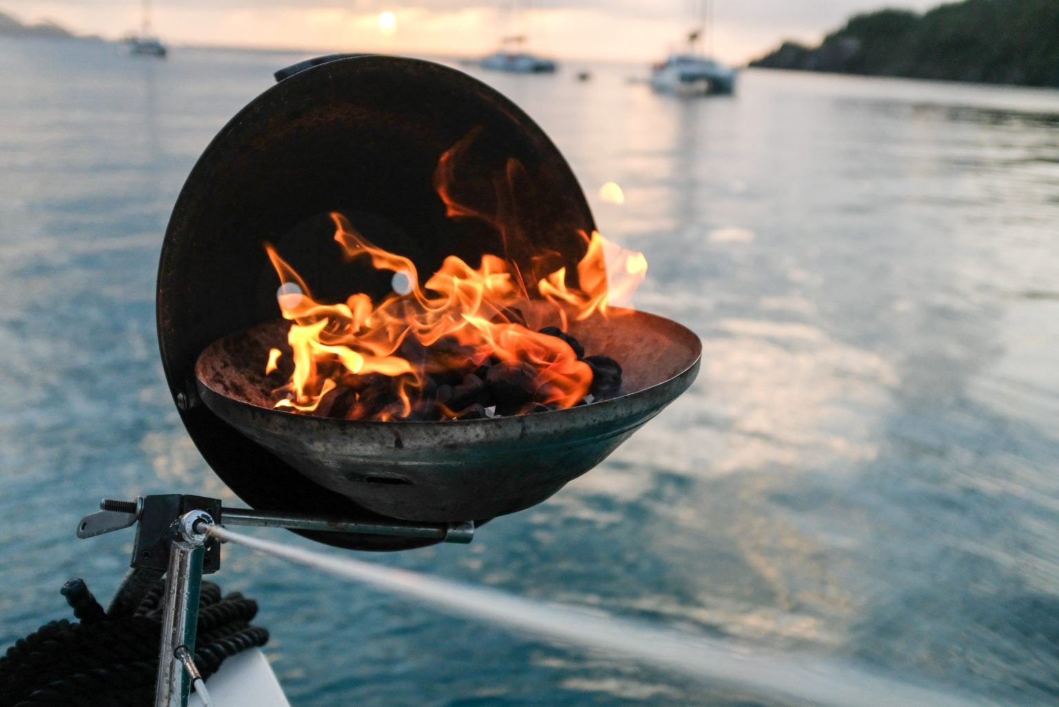 Barbecue fire beside the water
