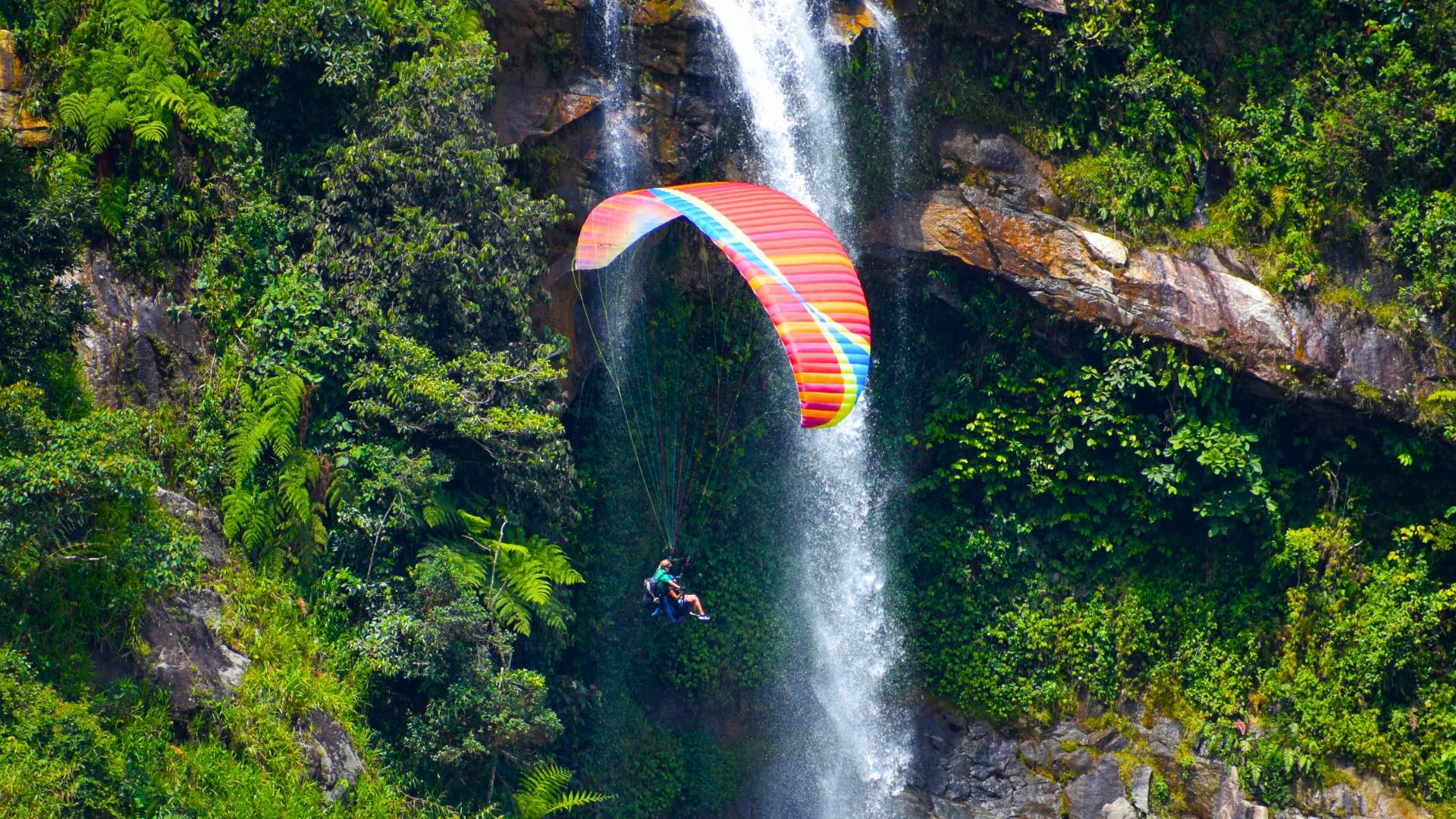 Private Paragliding Flight Over Waterfalls Near Medellín