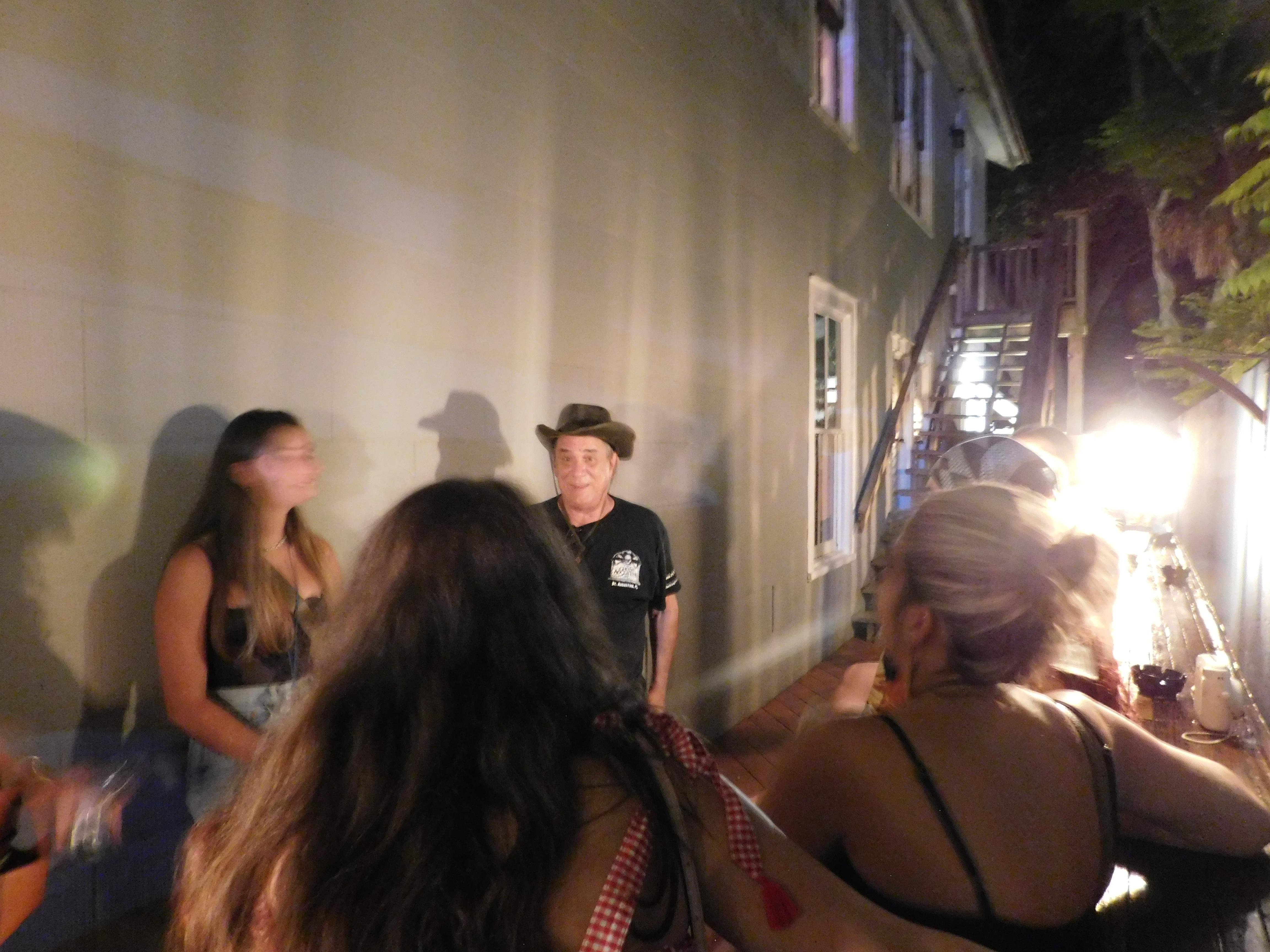 St Augustine haunted pub crawl — visitors raising glasses inside a historic pub in the oldest American city