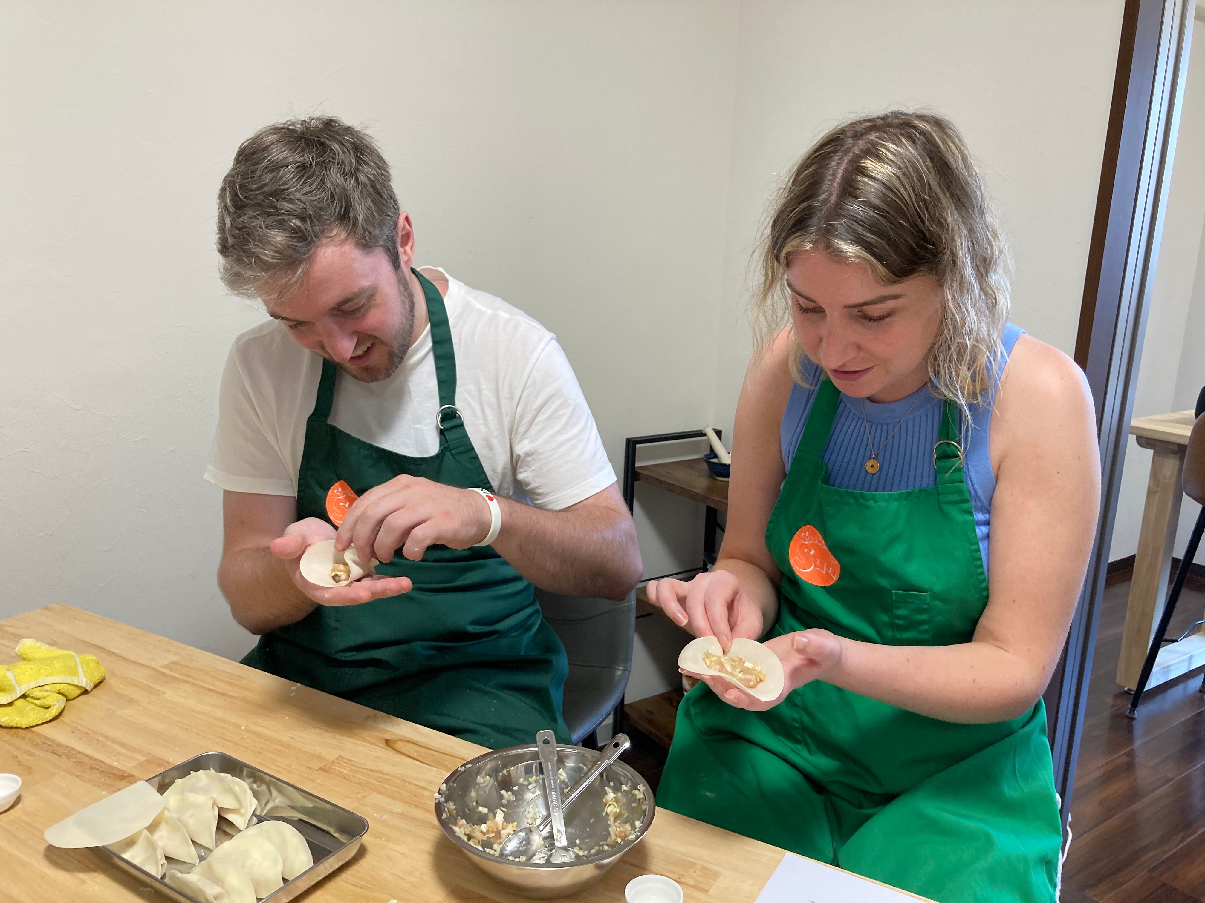Osaka cooking class — takoyaki pan, ramen, hand-rolled sushi and the okonomiyaki griddle — image 1