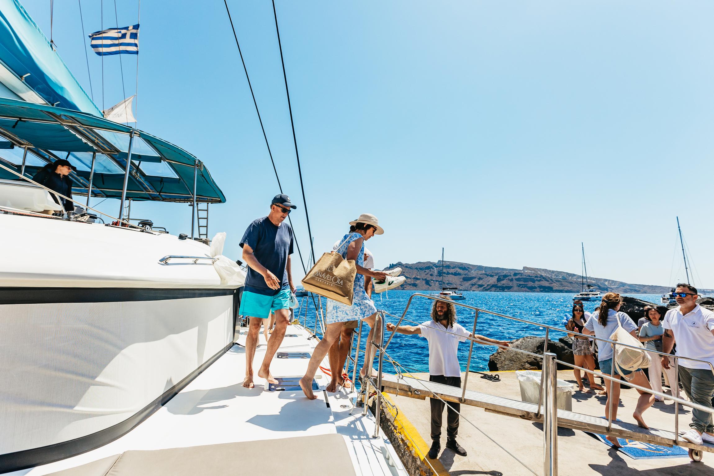 Santorini Luxury Catamaran Day Trip with Meal & Open Bar
