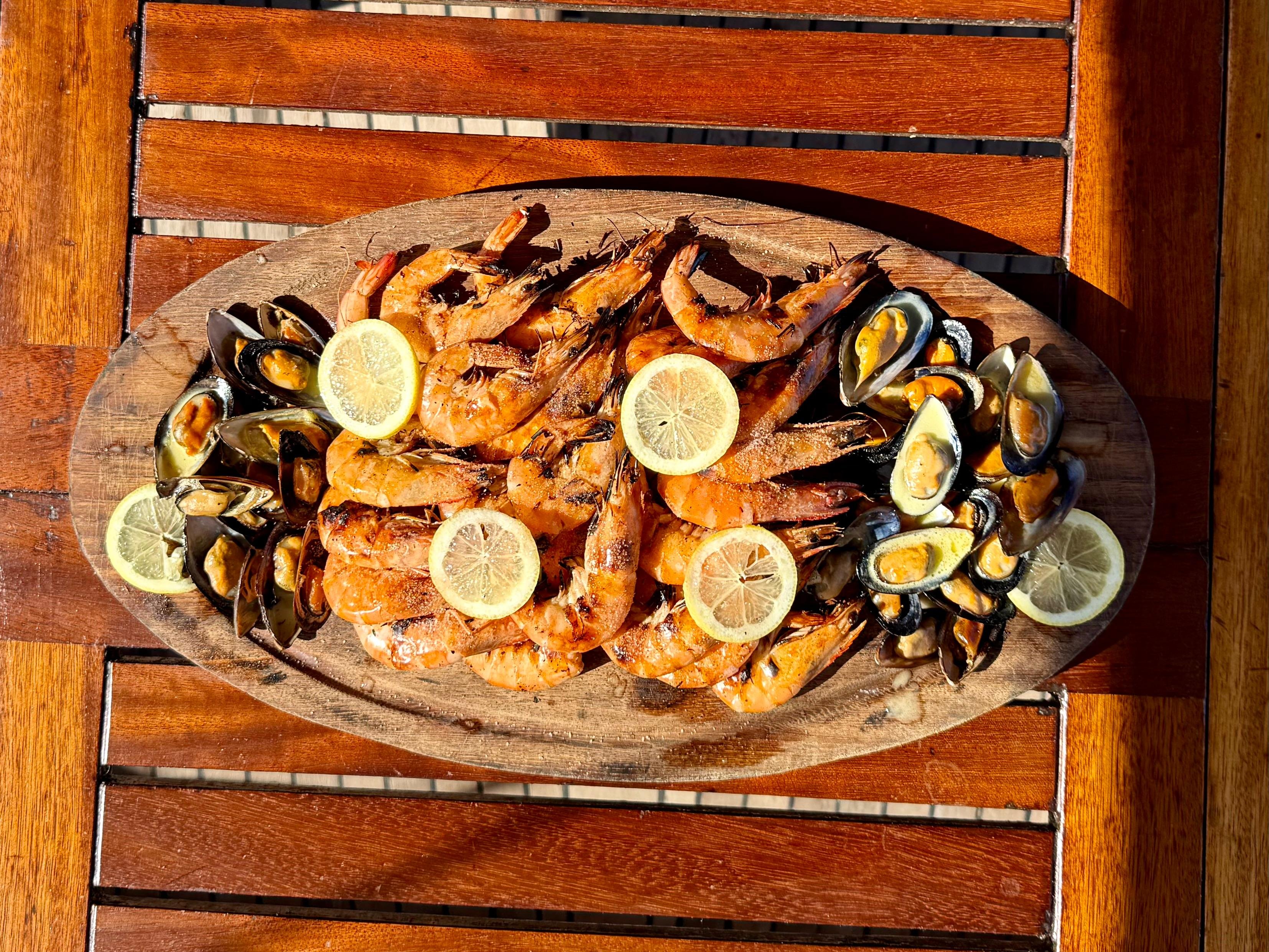 Mykonos Sunset Coastal Cruise with Dinner & Drinks