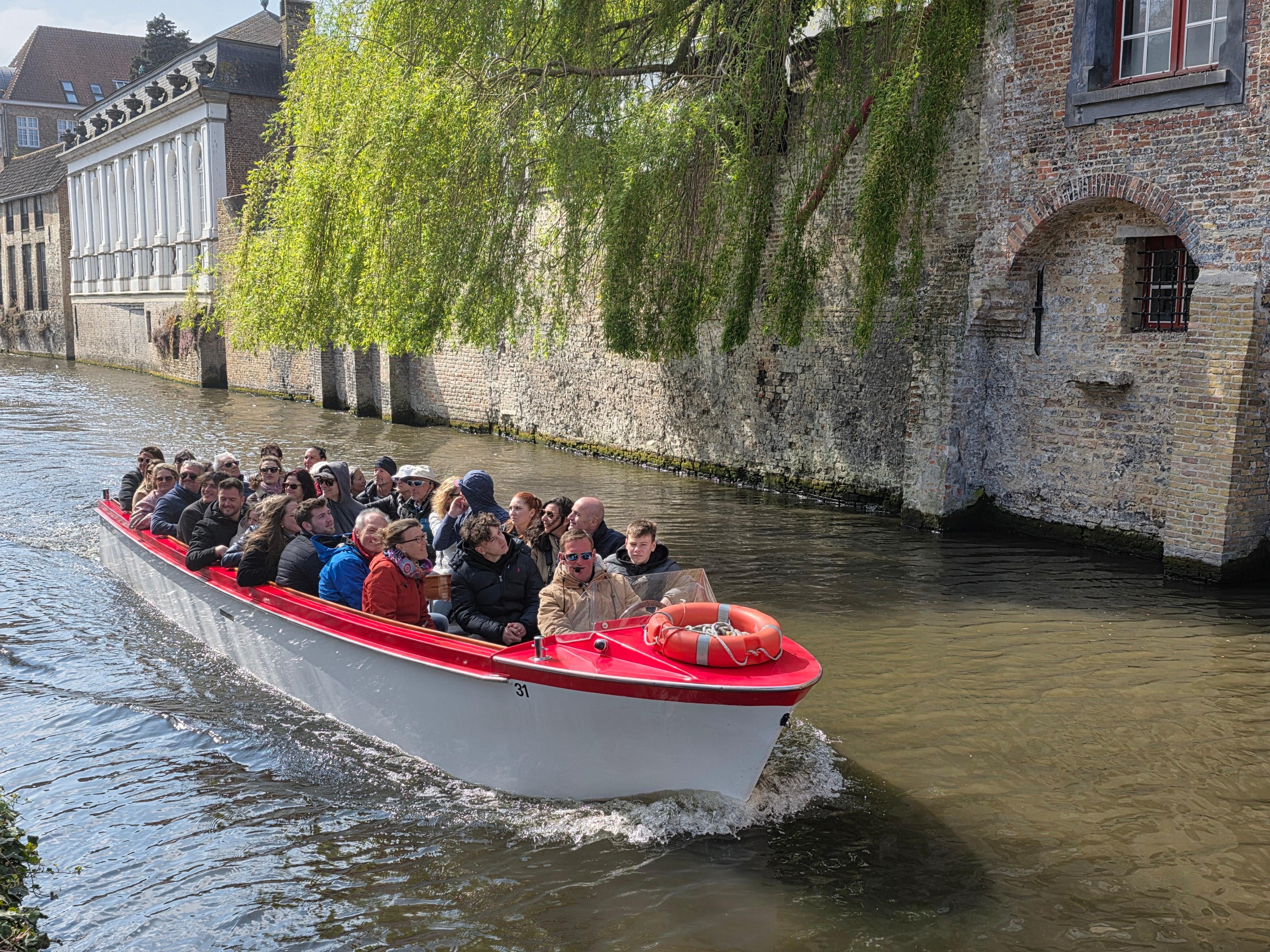 Bruges canal boat tour — medieval canals, low bridges, the Belfry and the Beguinage in the Venice of the North — image 29