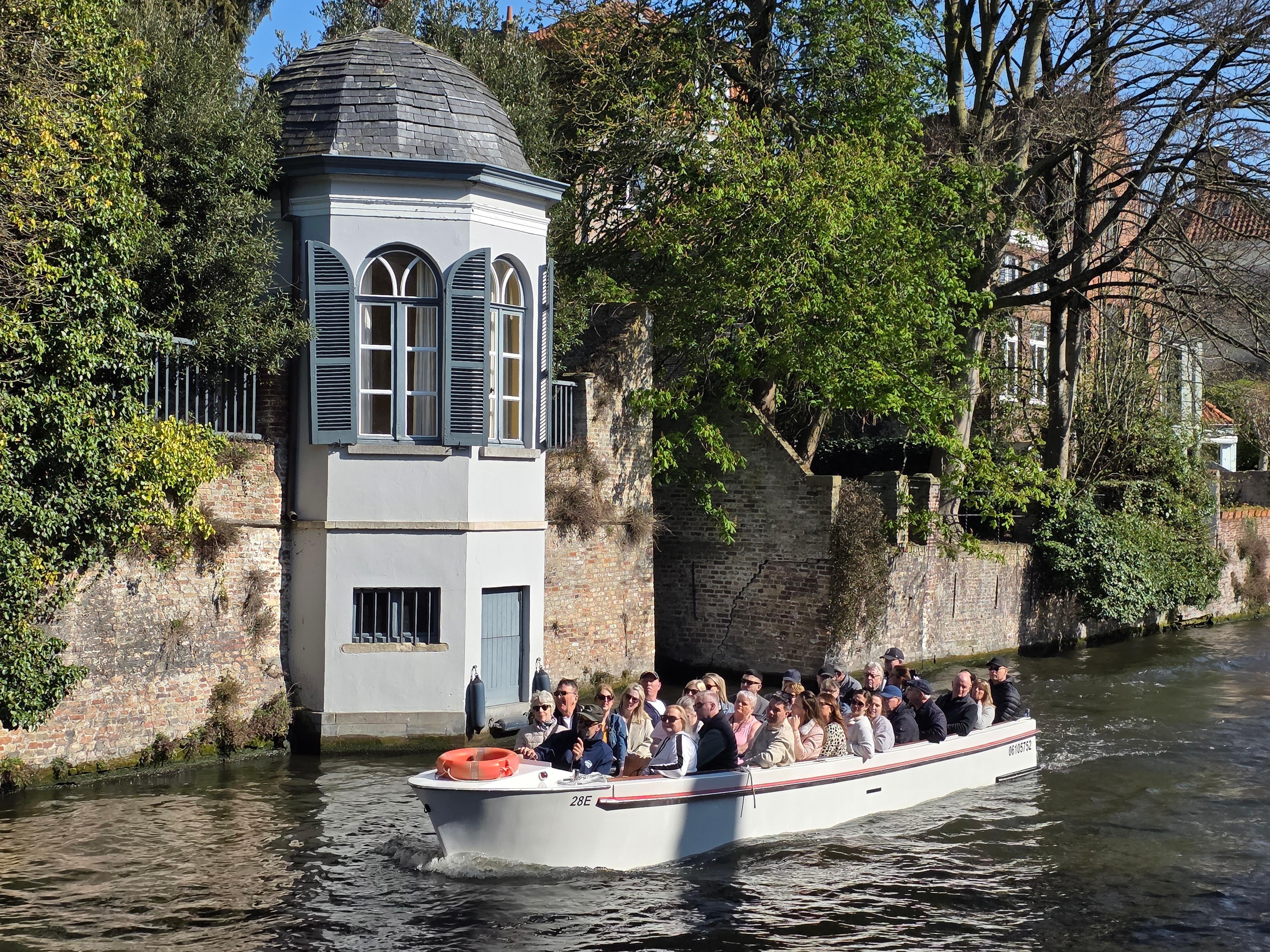Bruges canal boat tour — medieval canals, low bridges, the Belfry and the Beguinage in the Venice of the North — image 36