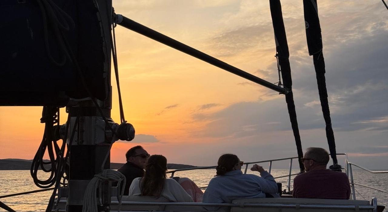 Mykonos Sunset Coastal Cruise with Dinner & Drinks