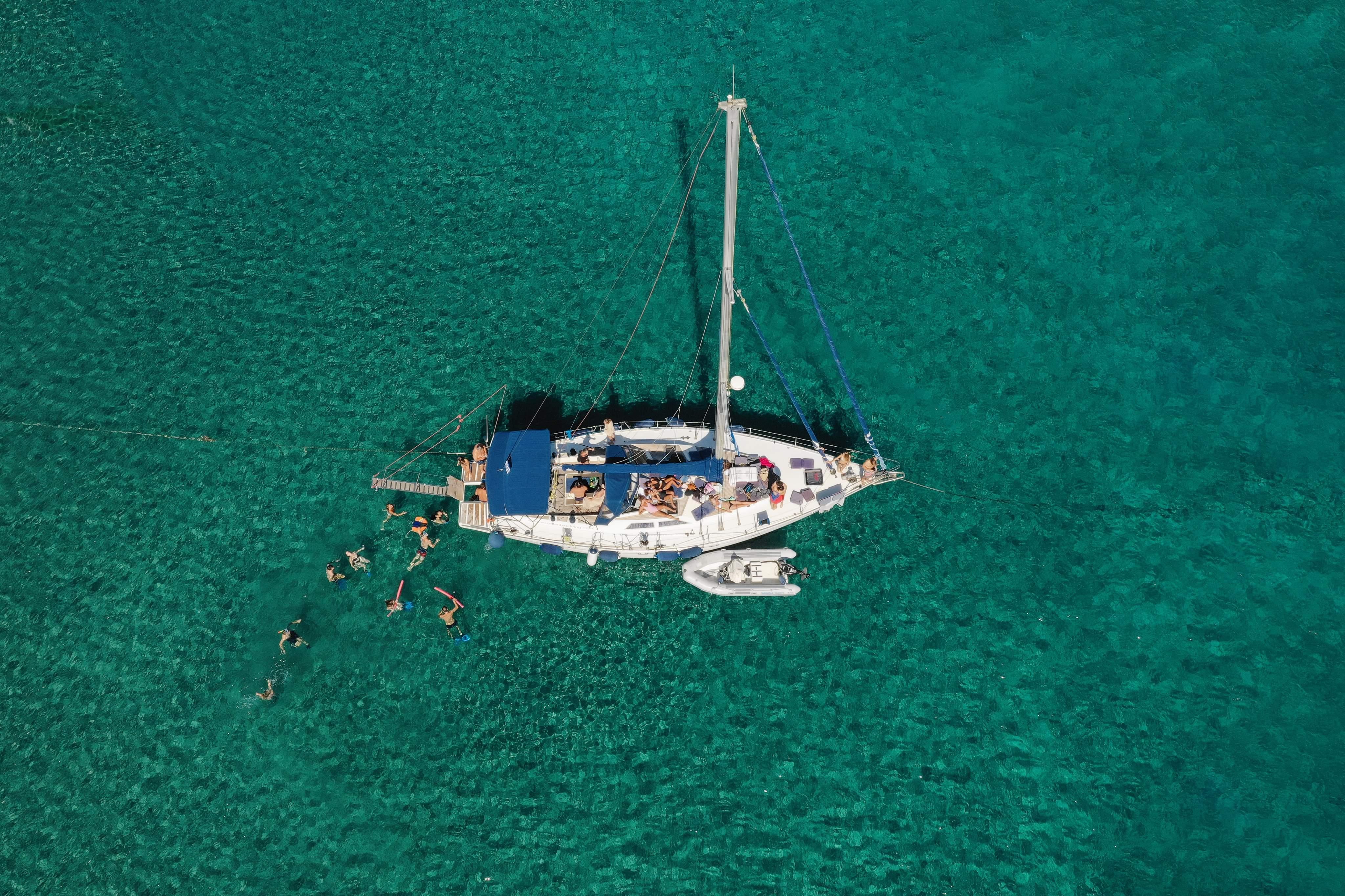 Kleftiko boat tour Milos sea caves arches sailing — image 4