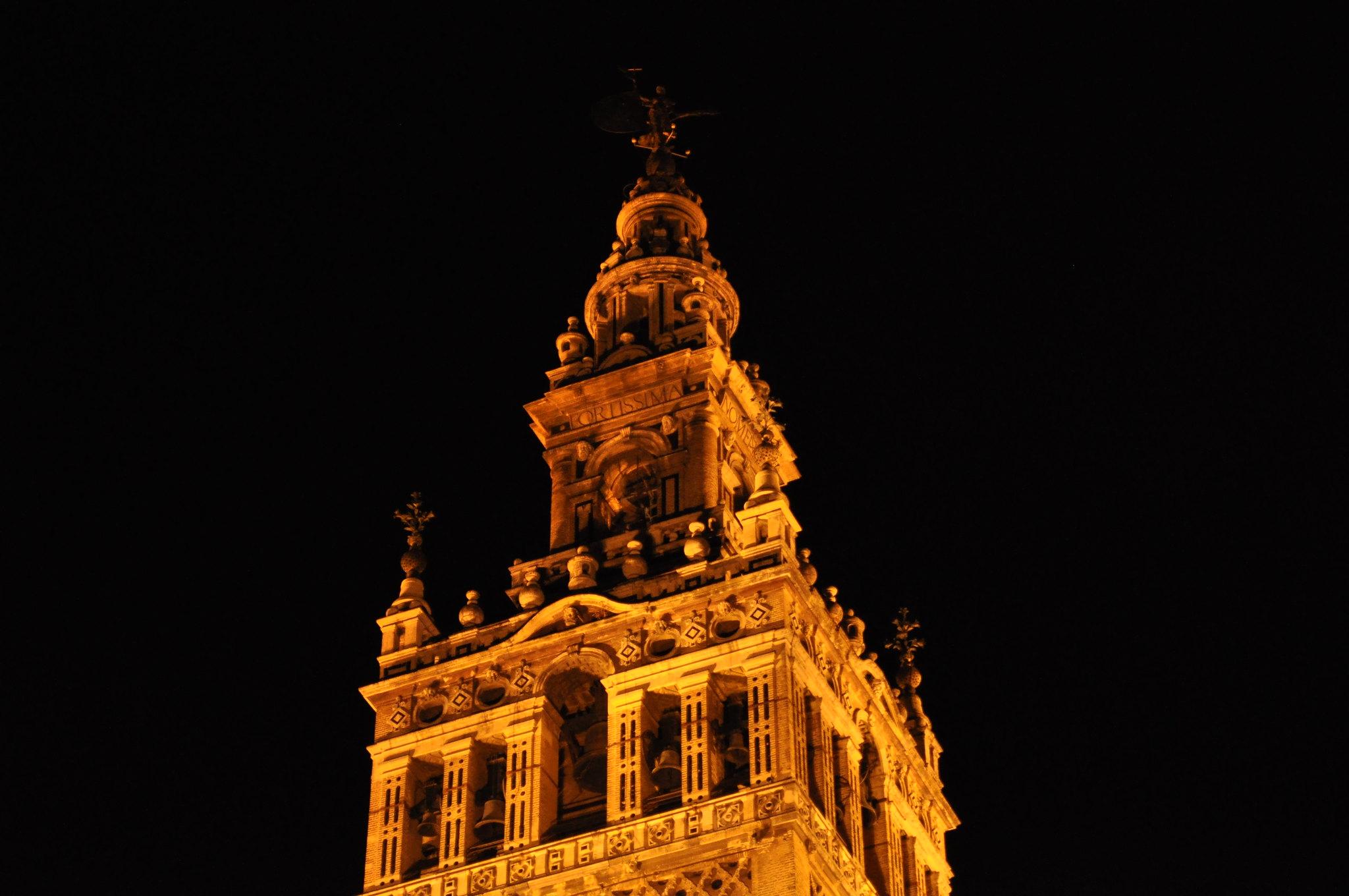 Seville Nocturnal Discovery: Historic Center & Riverside Walk
