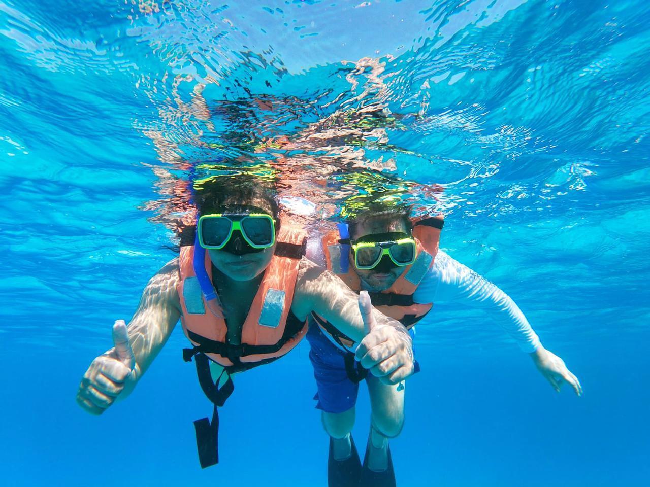 Isla Mujeres Catamaran Day Trip: Open Bar, Snorkeling & Beach Club