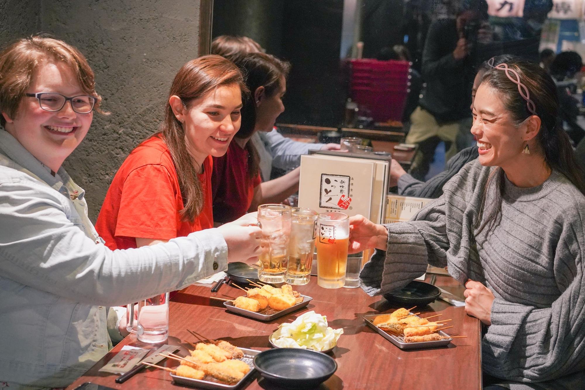 Osaka Street Food Walking Tour with Okonomiyaki Cooking