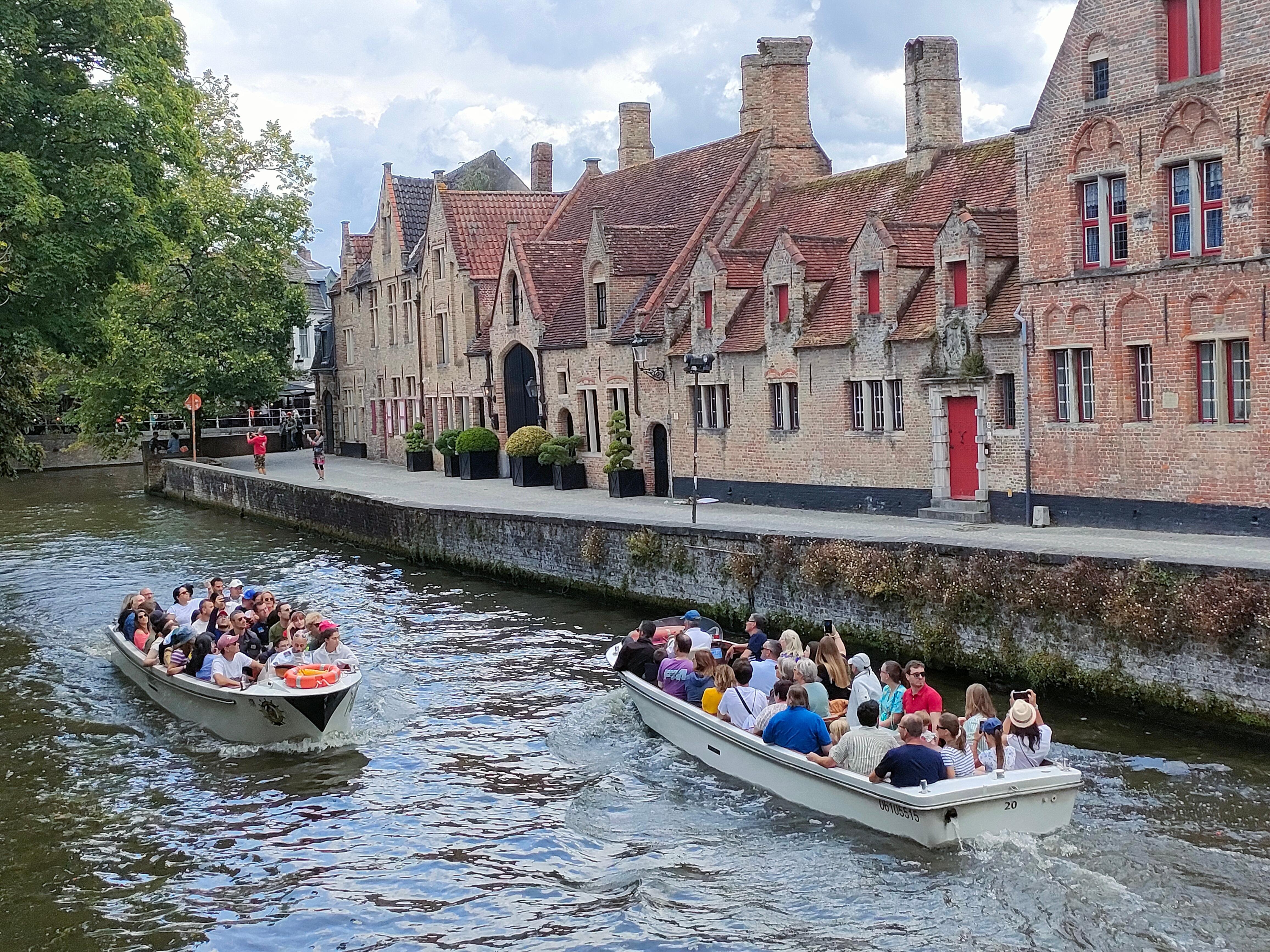 Bruges canal boat tour — medieval canals, low bridges, the Belfry and the Beguinage in the Venice of the North — image 10