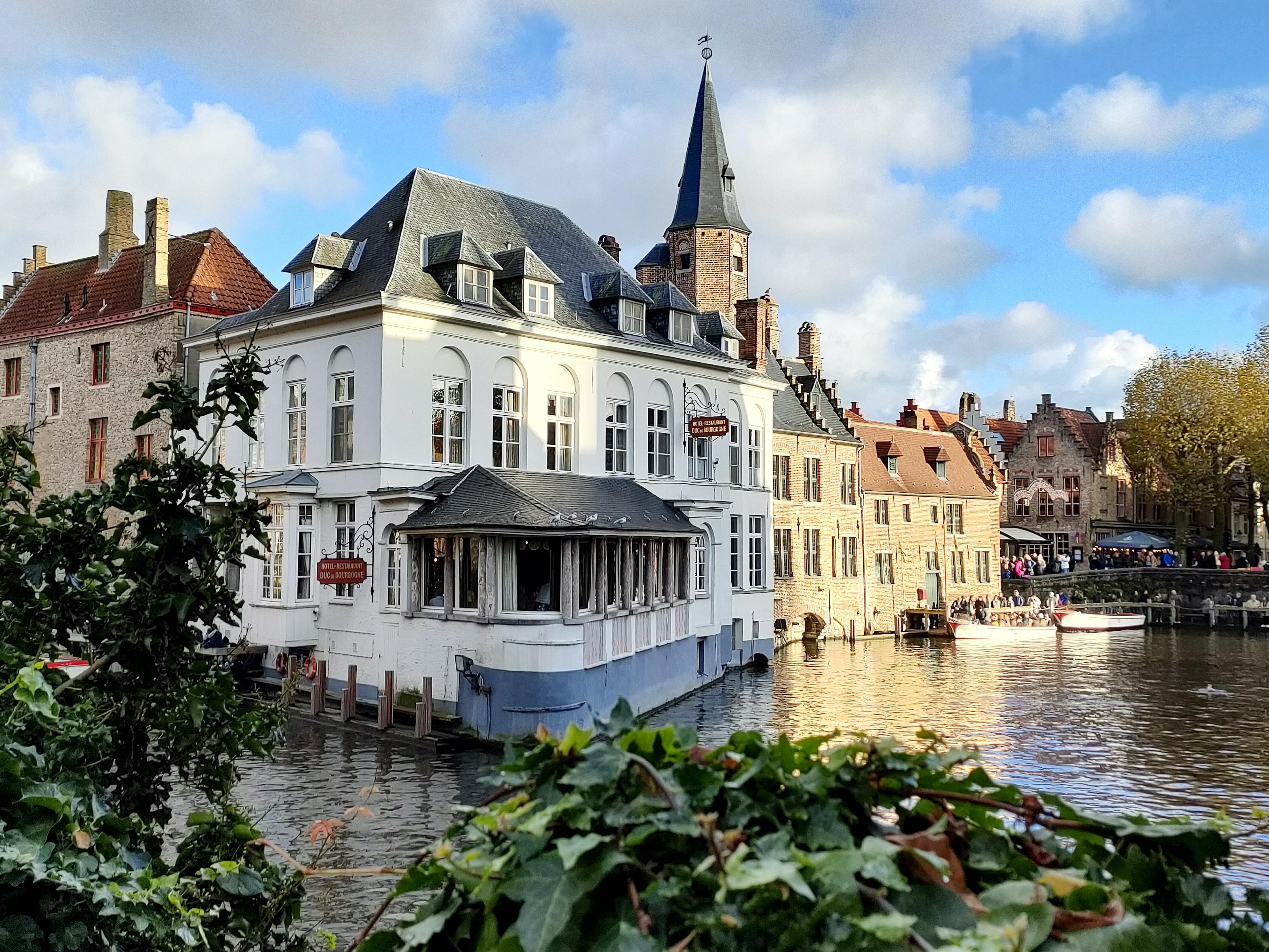 Bruges canal boat tour — medieval canals, low bridges, the Belfry and the Beguinage in the Venice of the North — image 12
