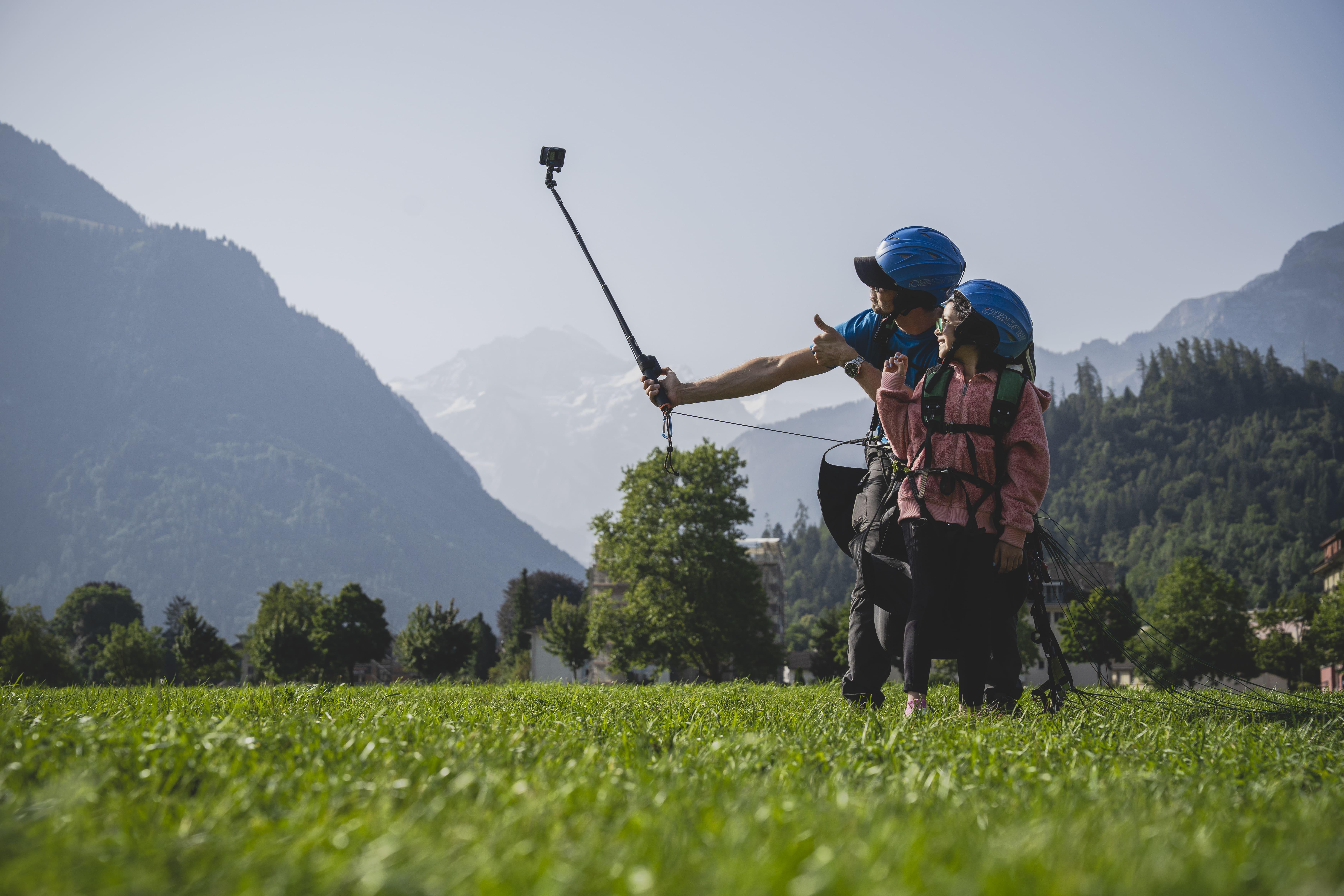 Tandem paragliding over Interlaken Bernese Oberland Switzerland alpine lakes — image 8