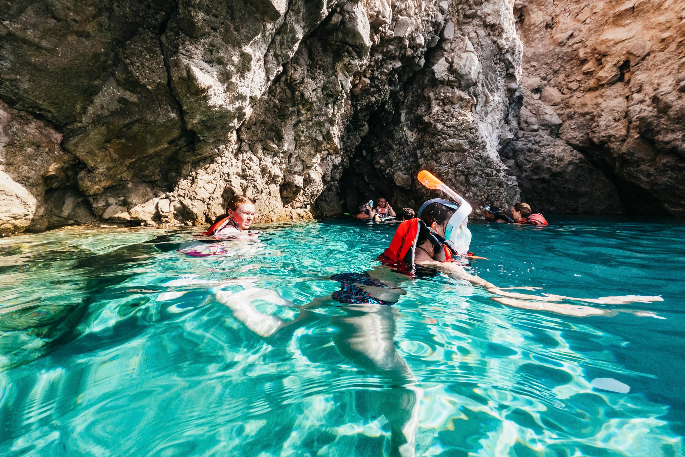 Milos kayak tour Tsigrado Gerakas sea caves south coast — image 1