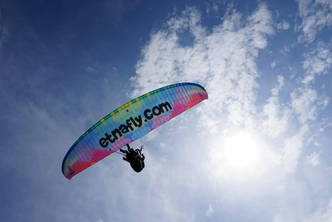 Tandem Paragliding Over Taormina with Champion Pilots