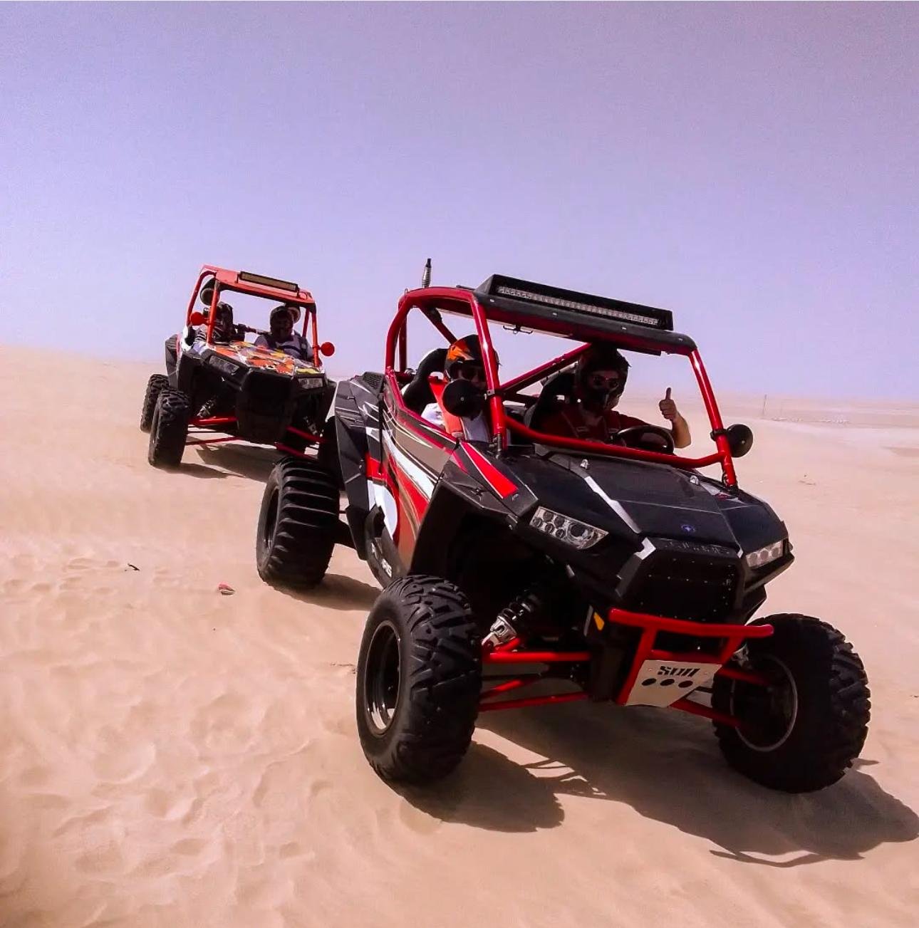 Doha Desert Safari: Sunset Dune Bashing, Camel Ride & Sandboarding