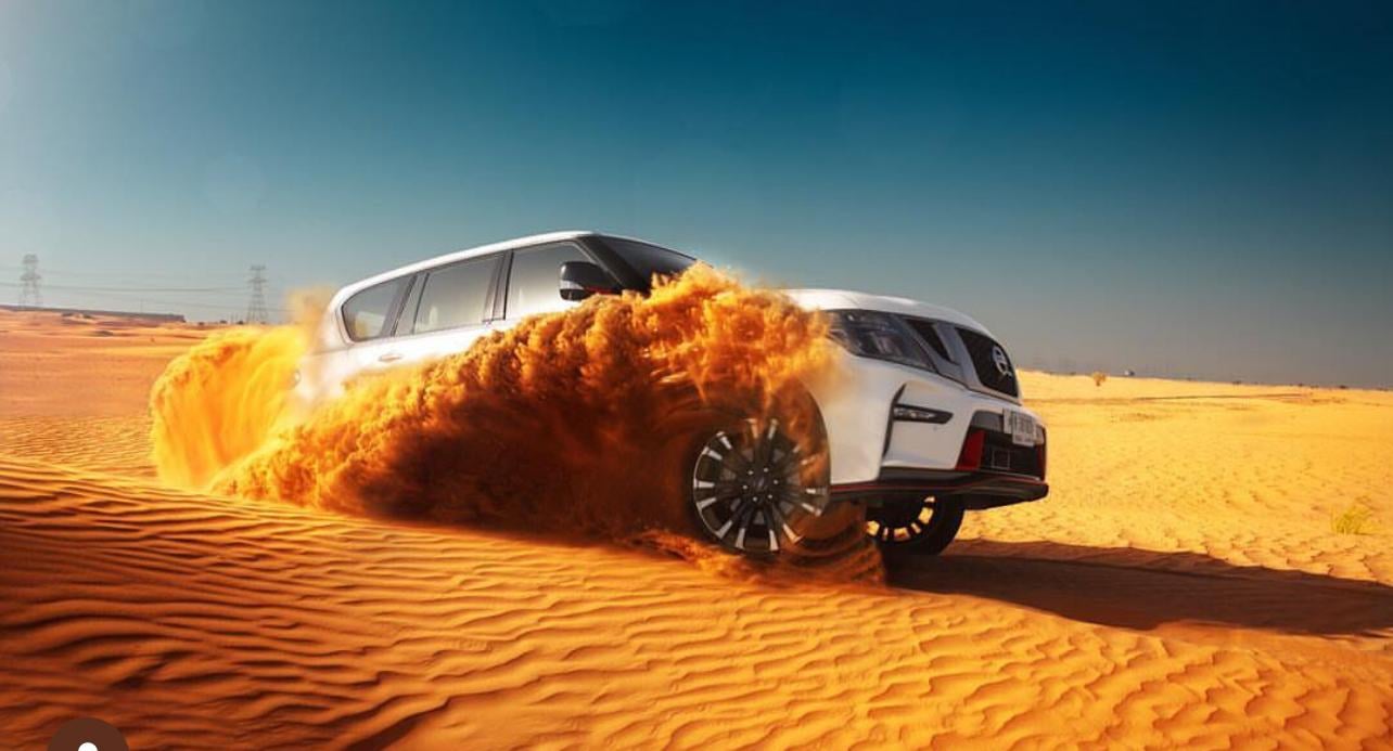 Doha Desert Safari: Sunset Dune Bashing, Camel Ride & Sandboarding