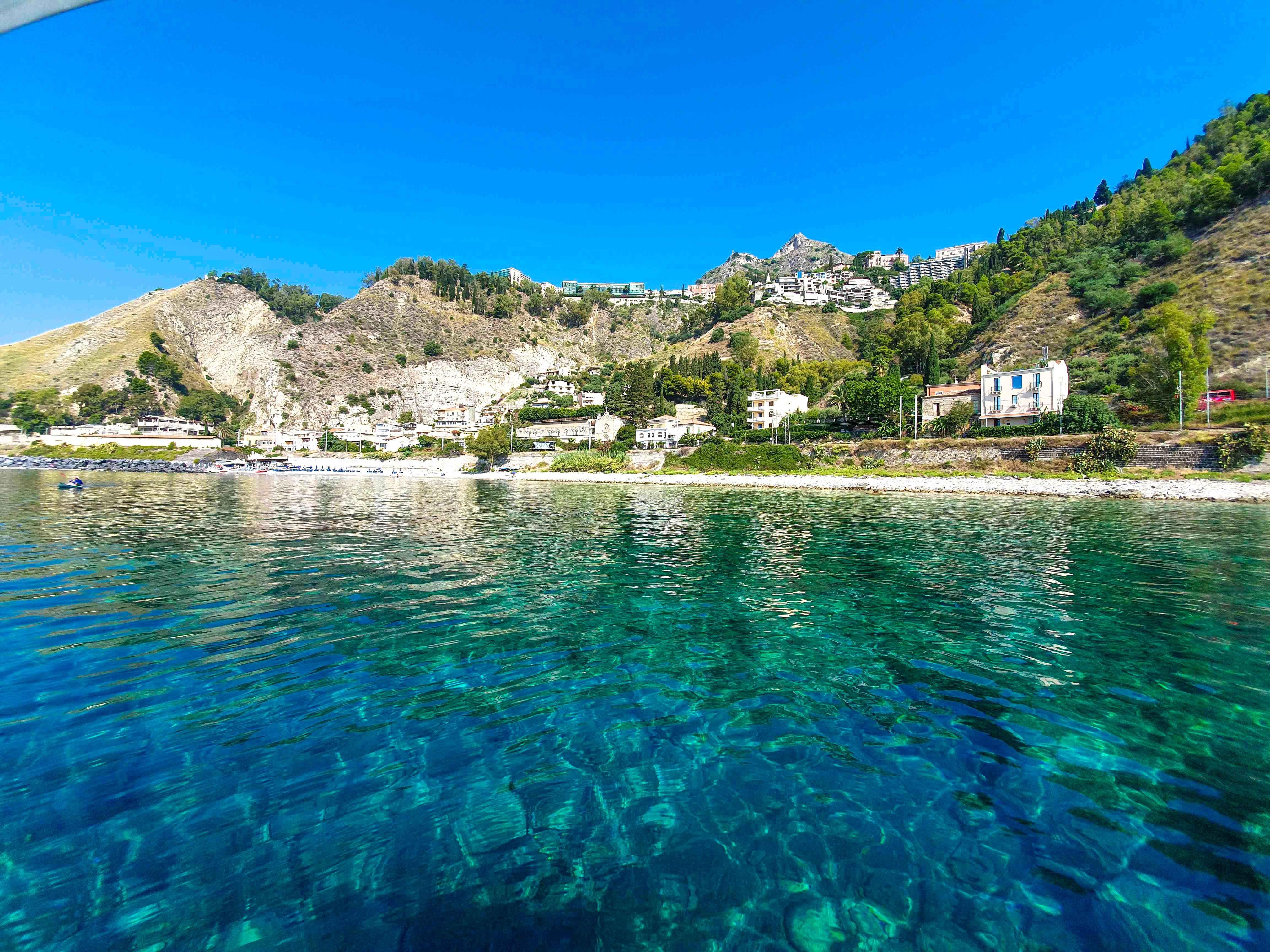 Taormina Coast Boat Cruise with Sicilian Wine & Snorkeling