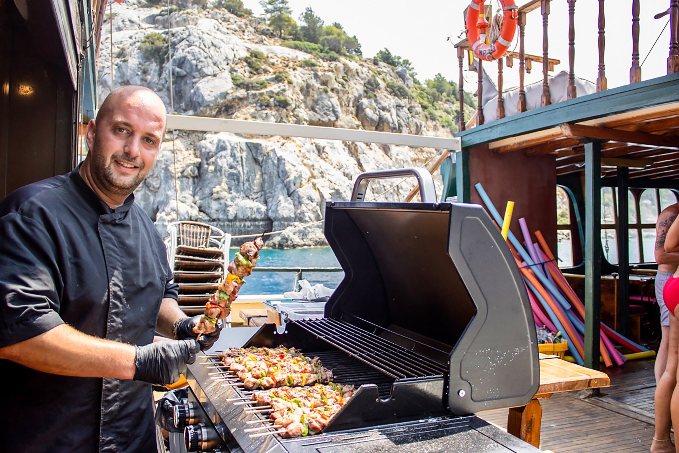 Rhodes Sunset Cruise with Greek BBQ & Unlimited Drinks