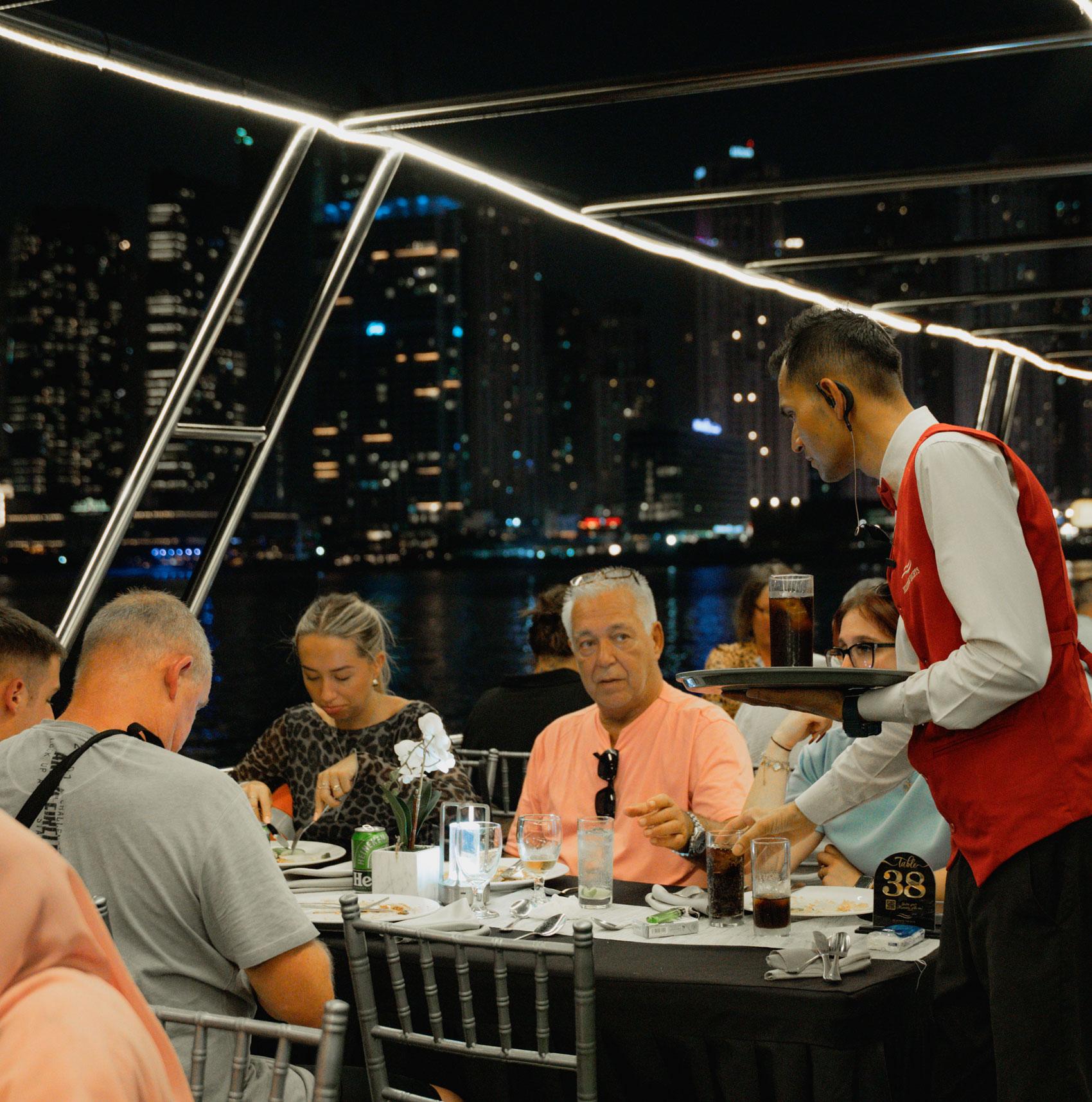 Dubai Marina Sunset & Dinner Cruise with Live Music & Open Bar