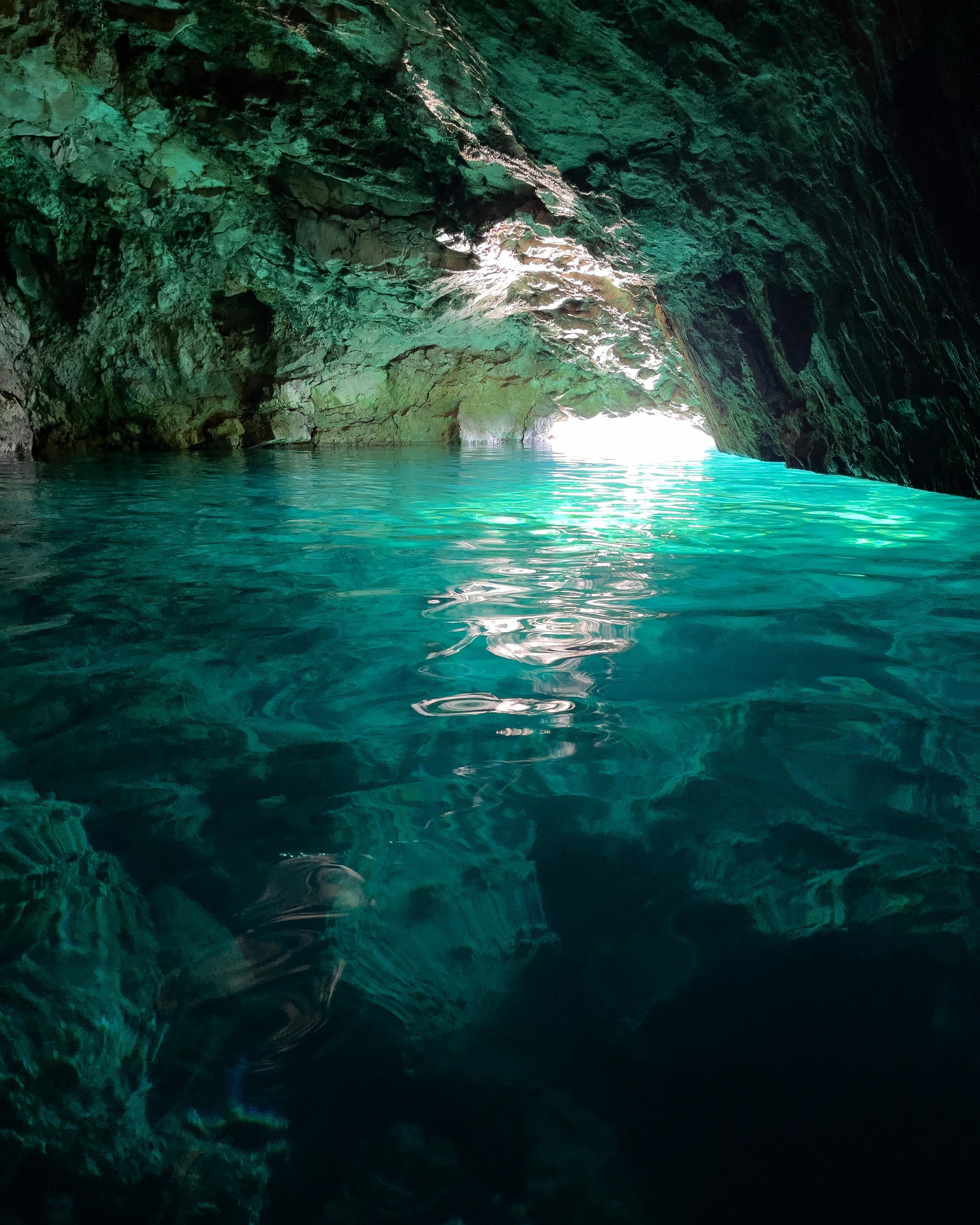Boat cruise through the Calanques National Park — tourists swimming in turquoise coves near Marseille, Provence