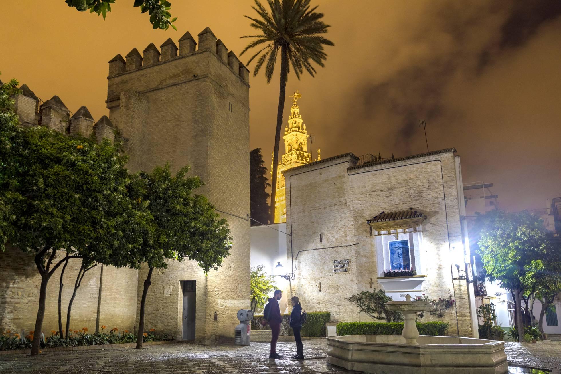 Seville Nocturnal Discovery: Historic Center & Riverside Walk